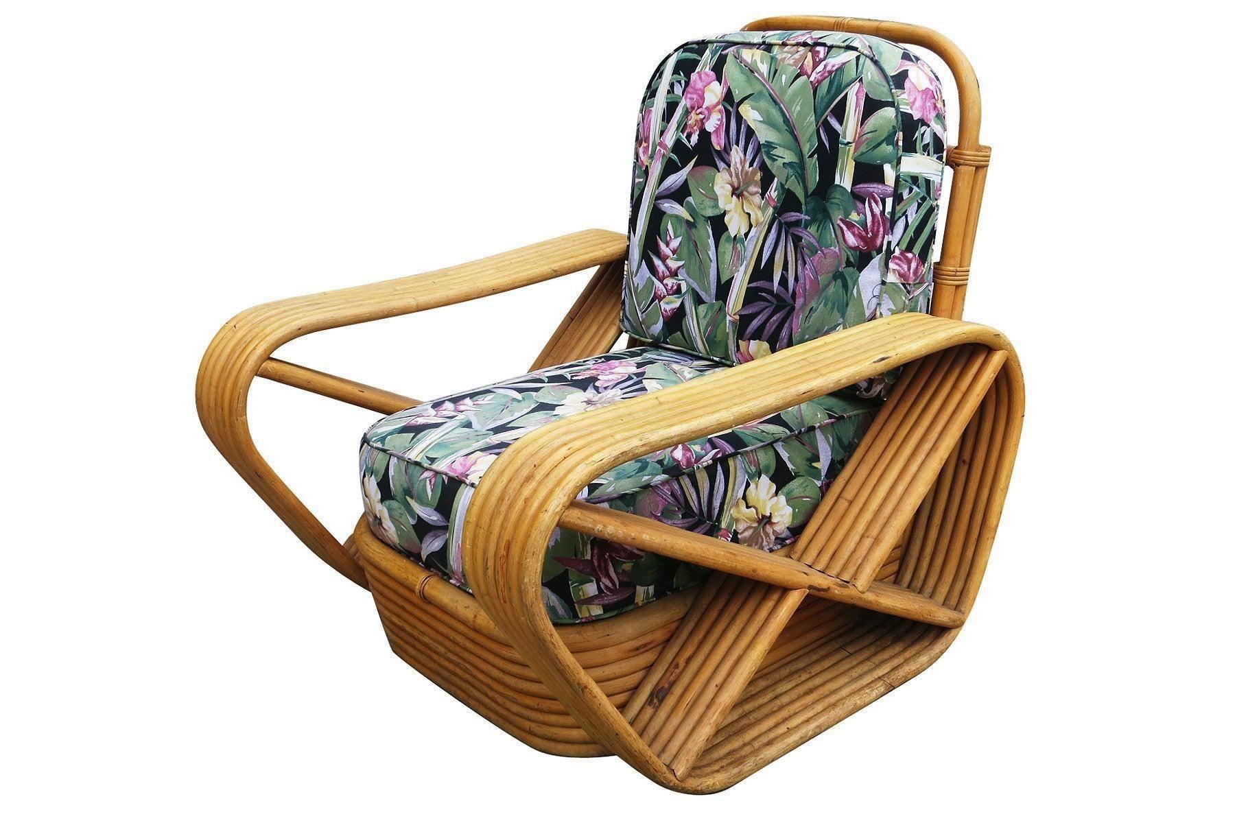 Designed in the manner of Paul Frankl, this six-strand, rattan lounge chair features square pretzel arms and a Classic stacked base. Included is the matching stacked rattan ottoman.
Measures:
Chair: 31