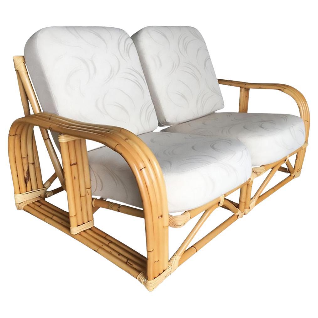 Restauriertes Paul Laszlo-Rattan-Sofa mit viersträngigen Unterteilten im Angebot