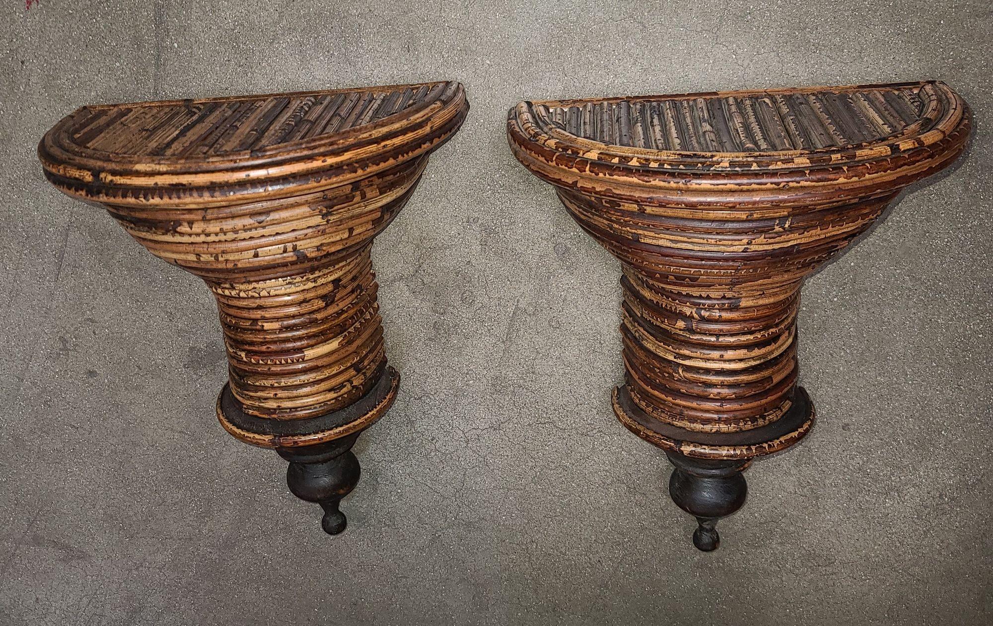Set of 2 pencil reed rattan wall shalf pedestal holders in the style of designer Gabrielle Crespi who specialized in reed rattan decor. Timeless chic with a boho flair.
Dimensions:
Height: 11.5