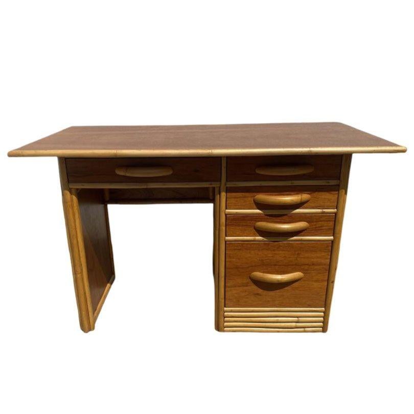 Stacked Koa Wood secretary desk with Koa Wood top and rattan accents, center drawer with four drawers on each side of the desk.

Measures: 29.5