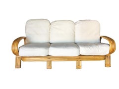 Restored Quad Pole "R" Arm 3 Seat Rattan Sofa