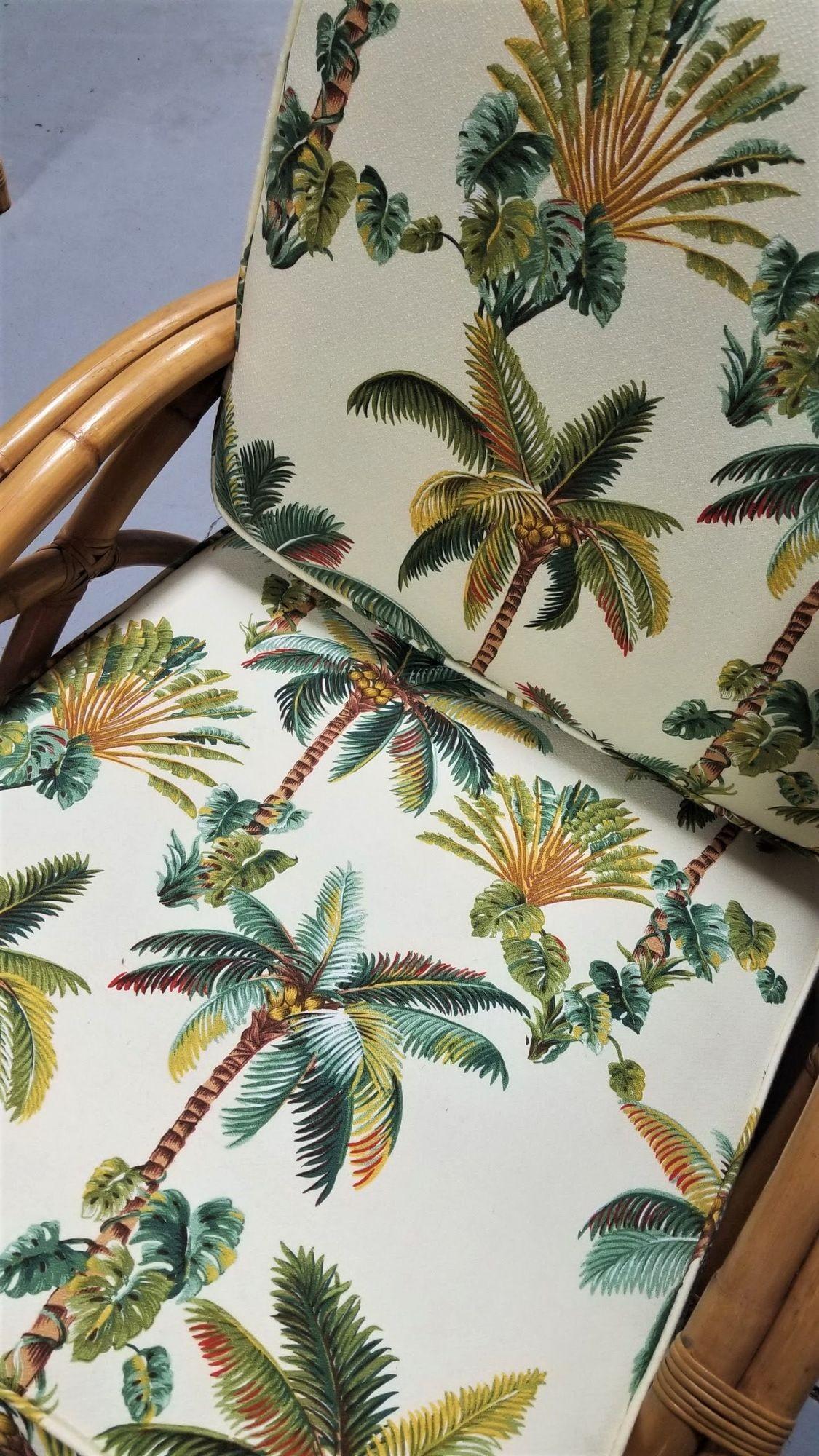 Restored 2-strand rattan half moon arms featuring a crossing arch design and tropical palm print cushions. 

We only purchase and sell only the best and finest rattan furniture made by the best and most well-known American designers and