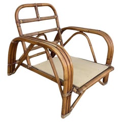 Restored Rattan Dark Stained Three-Strand "Staple" Arm Lounge Chair