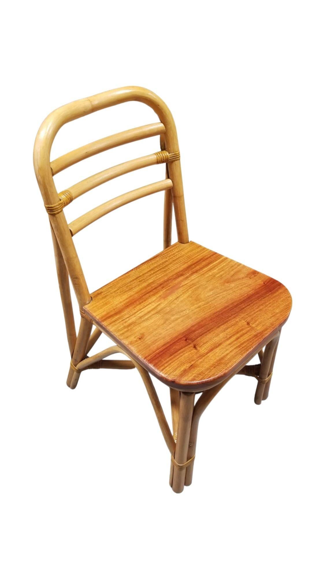 Vintage rattan dining room side chair with a solid mahogany seat included is a set of six chairs. Each chair features a three-strand rattan seat back with a mahogany seat.
1950, United States
We only purchase and sell only the best and finest rattan