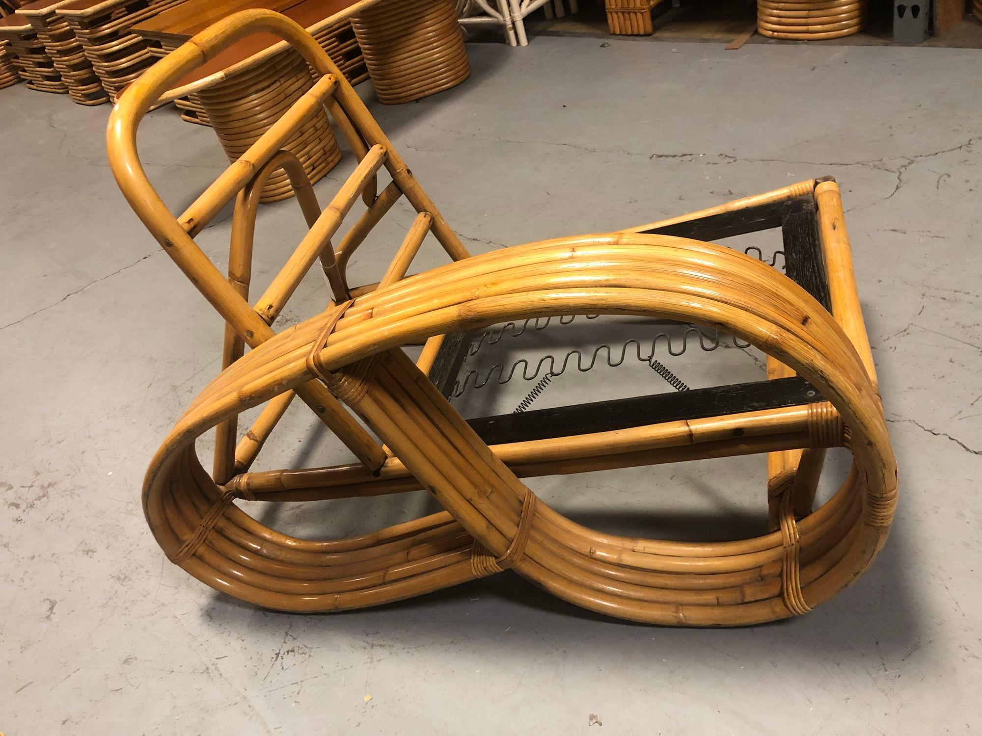 This is a unique one-of-a-kind lounge chair and accent chair featuring a substantial five-strand 3/4 reverse pretzel right arm. This piece stands alone as an eclectic addition to your unique seating area.

Restored to new for you.

We only purchase