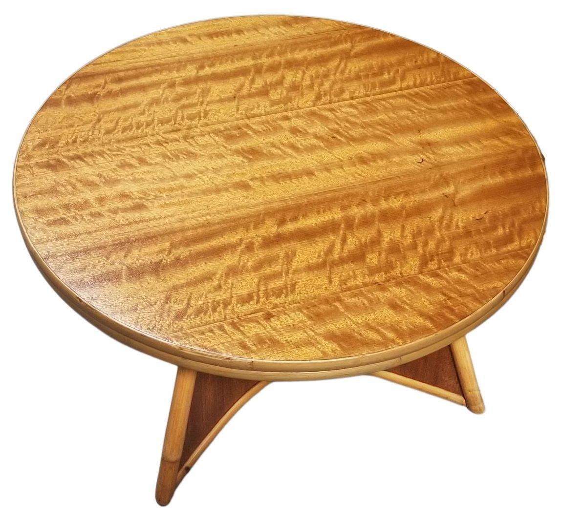 Set of three living room tables designed by Herbert and Shirley Ritts for the Rittz Furniture company. This includes a round center table with a luminous Curly Koa wood top, a Biomorphic coffee table, and a sizeable two-tier square table. The bent