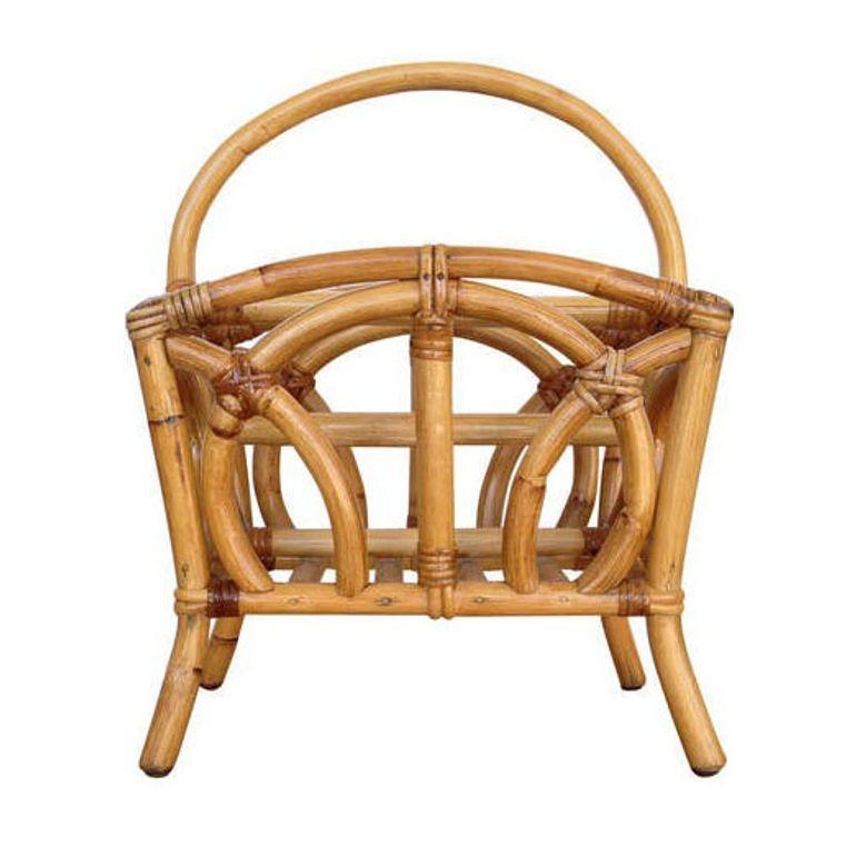 Early 1940 rattan magazine rack featuring a carrying handle and geometric pattern sides.
We only purchase and sell only the best and finest rattan furniture made by the best and most well-known American designers and manufacturers including:
Ritts