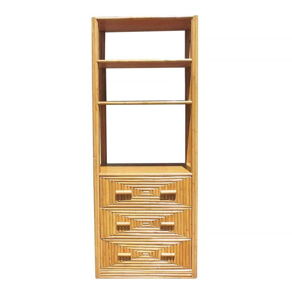 This beautifully restored Paul Frankl-inspired rattan display cabinet with mahogany shelving and side panels. This large 7' tall cabinet features three fixed shelves and a bottom cabinet with three drawers for storage. It is perfect for use as a