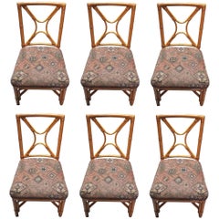 Ensemble de 6 chaises de salle à manger en rotin restauré, avec dossier en X et enveloppes en cuir.