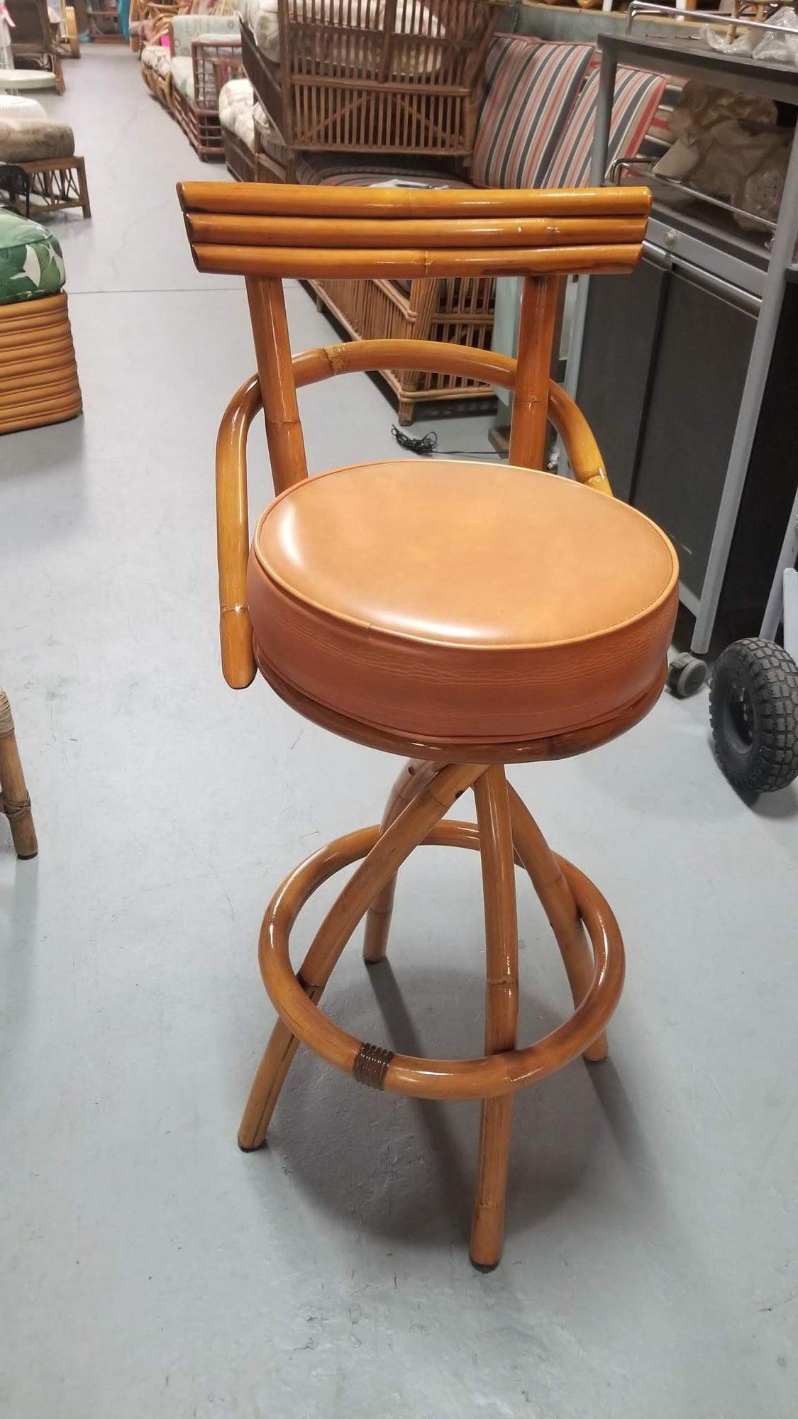 Mid-20th Century Restored Rattan Spiral Legs Orange Barstool Set of Three with Swivel Seats