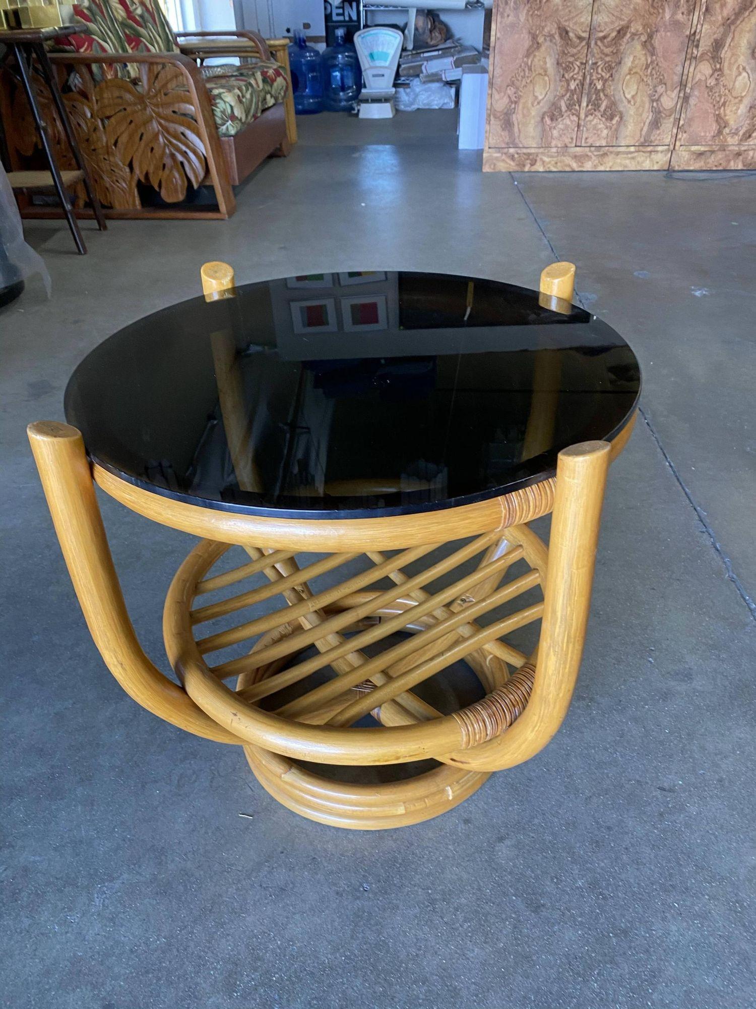 American Restored Rattan Stacked Base Cocktail Table W/ Smoked Glass Top For Sale