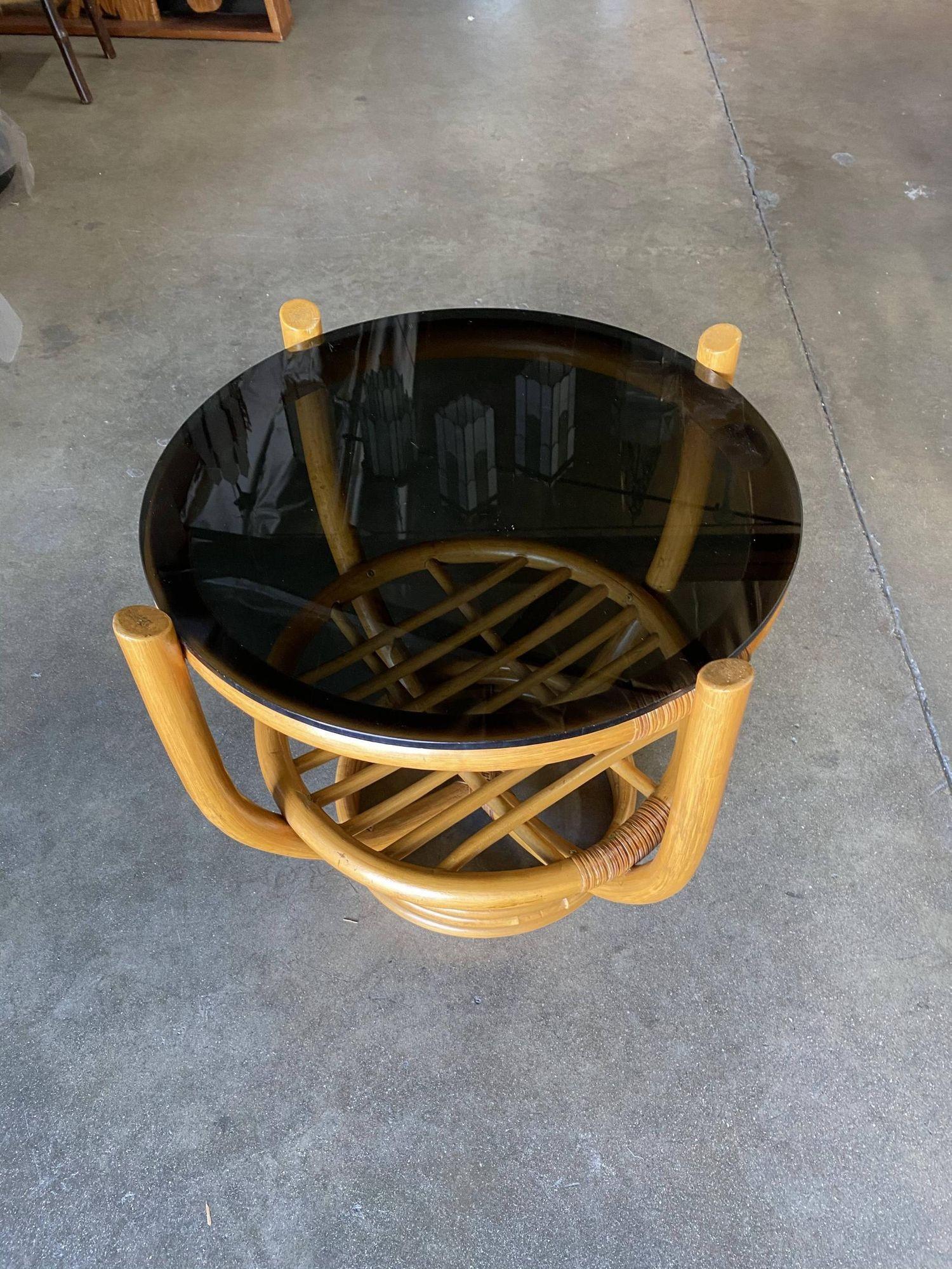 Restored Rattan Stacked Base Cocktail Table W/ Smoked Glass Top In Excellent Condition For Sale In Van Nuys, CA