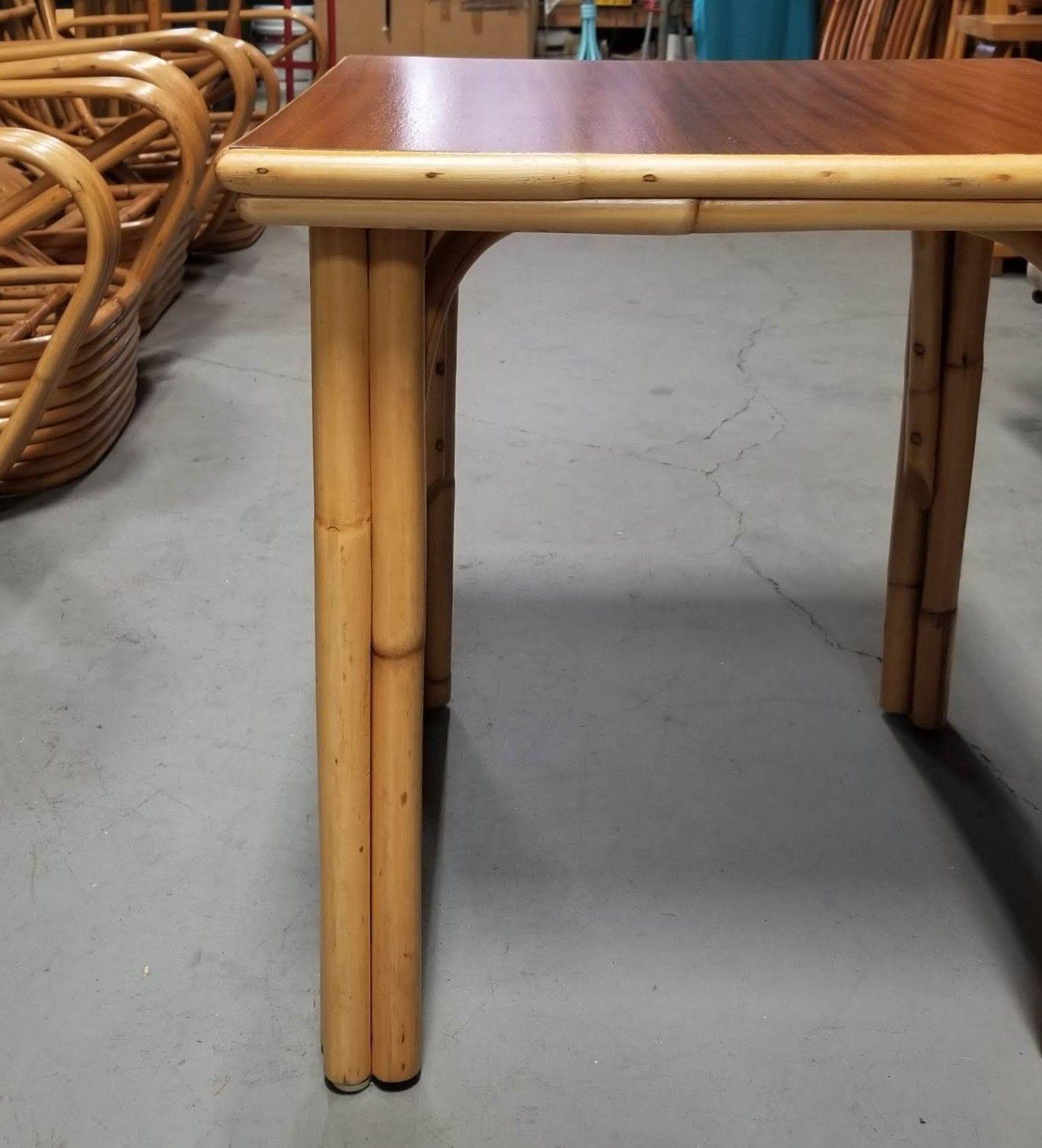 Restored Rattan Three-Strand Arched Legs Coffee Table with a Solid Mahogany Top In Excellent Condition For Sale In Van Nuys, CA