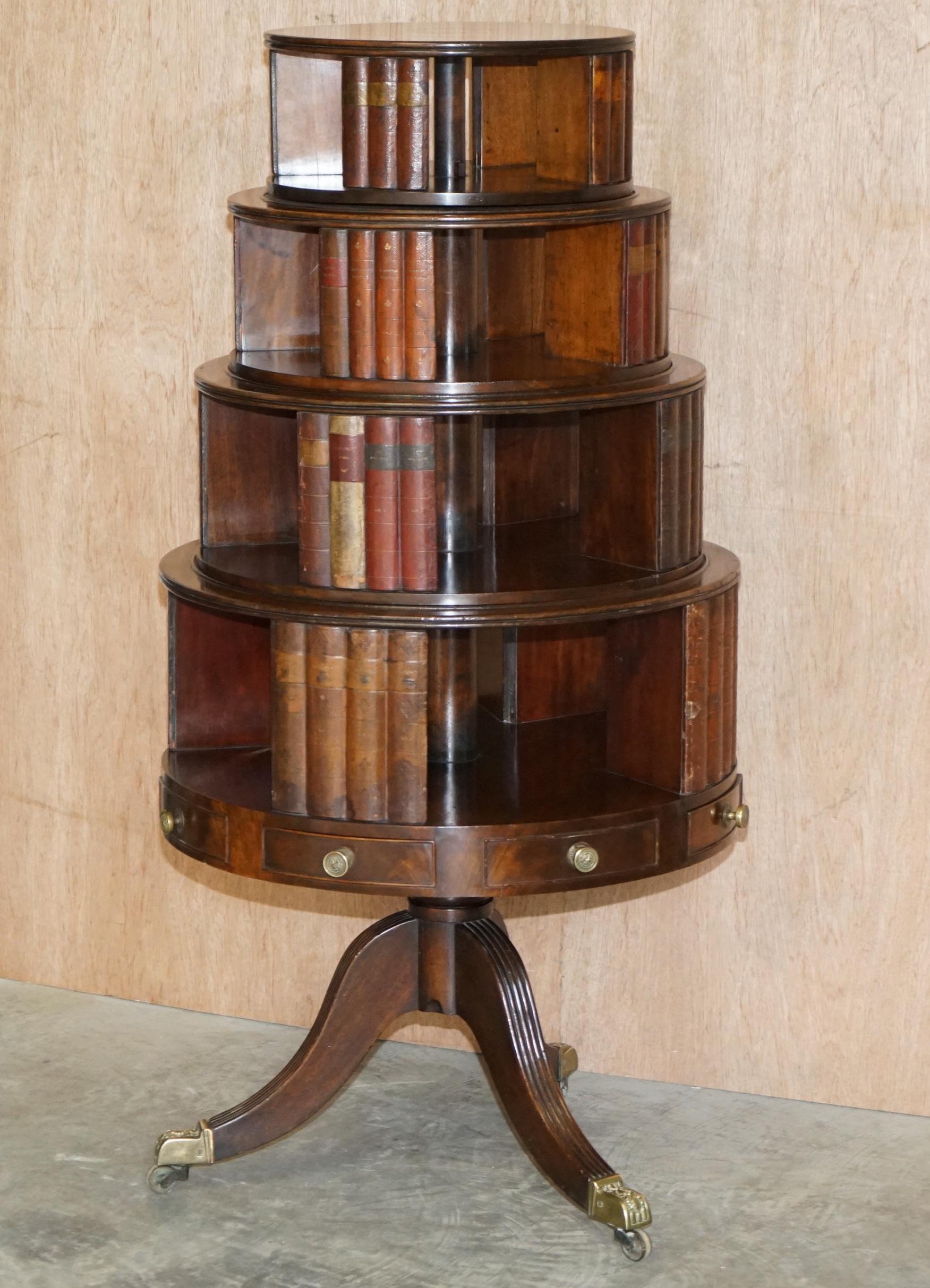 We are delighted to offer this very fine, highly collectable original Regency circa 1810 revolving library bookcase in mahogany with leather faux books

If you are looking at this listing then most likely you know what this is, these are