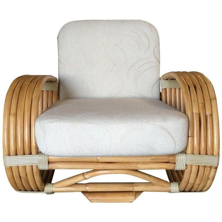 Four-strand 3/4 reverse pretzel rattan sofa and four-strand lounge chair set both feature a decorative wave detail on the base.

Sofa: 28