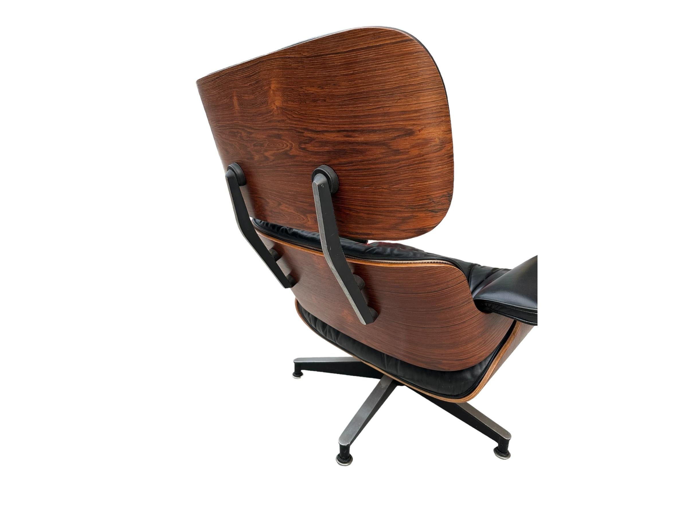 Restaurierter Eames-Stuhl und Ottomane aus Palisanderholz im Angebot 4