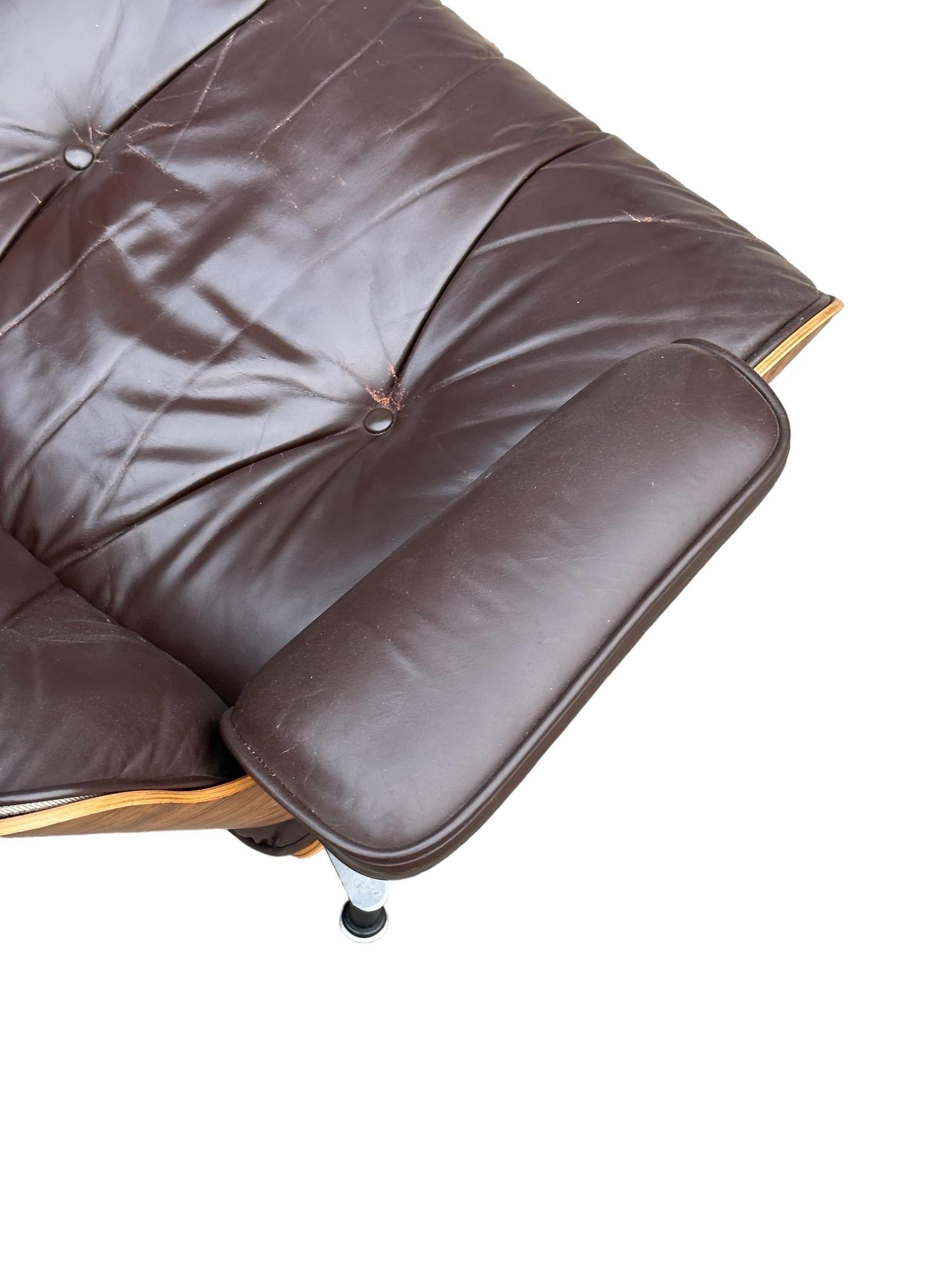 Restored Rosewood Eames Lounge Chair with Brown Leather Cushions For