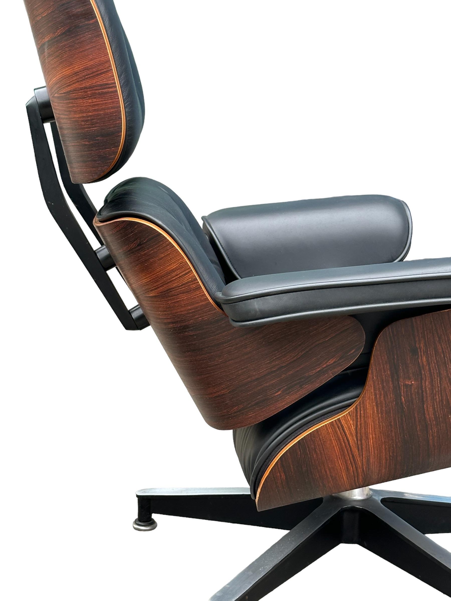 Restored Rosewood Eames lounge Chair with New Herman Miller Leather