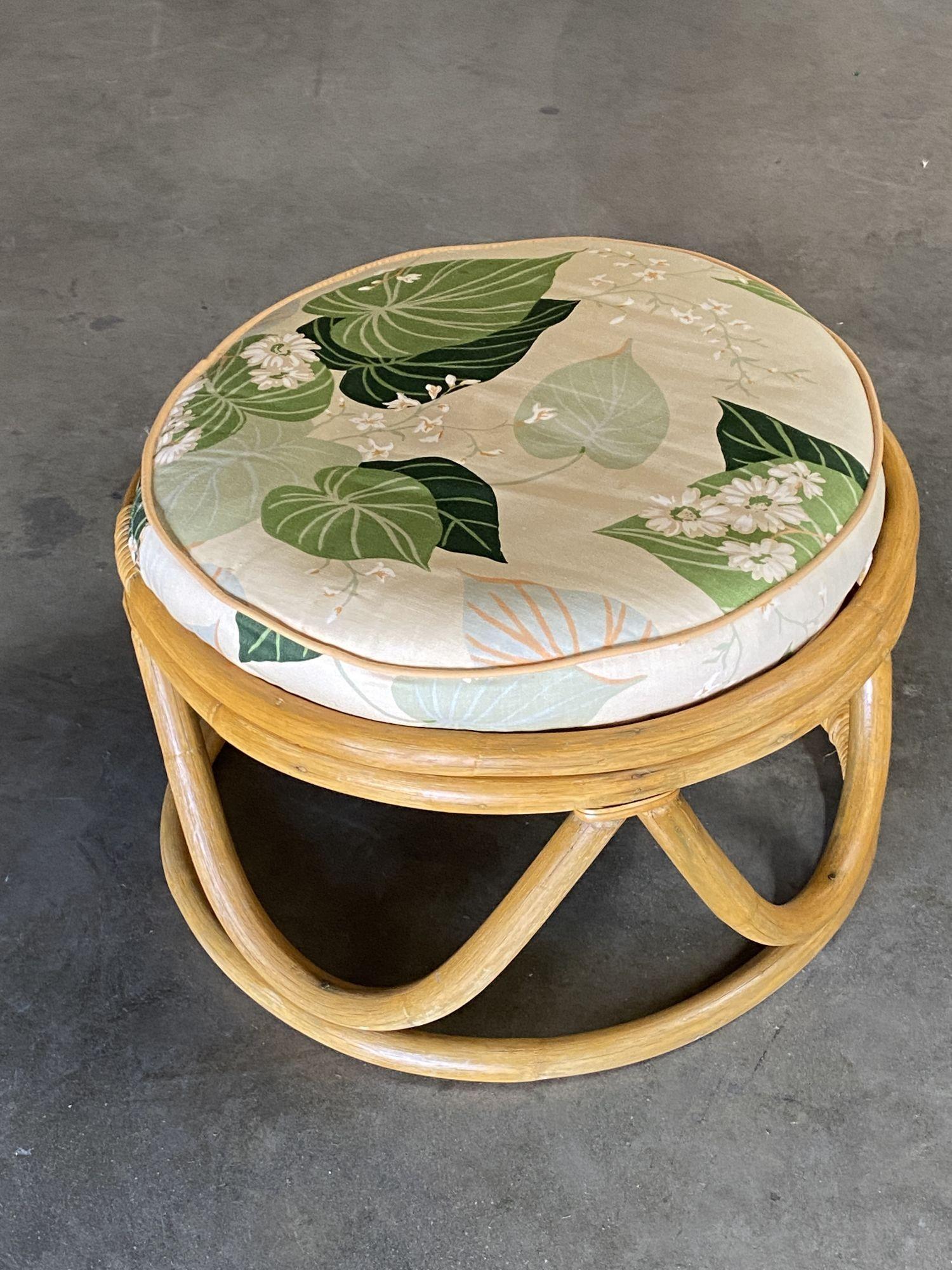 Fully restored round stacked rattan ottoman stool recovered in headstock original 1940s barkcloth fabric. Available- 2 We only purchase and sell only the best and finest rattan furniture made by the best and most well-known American designers and