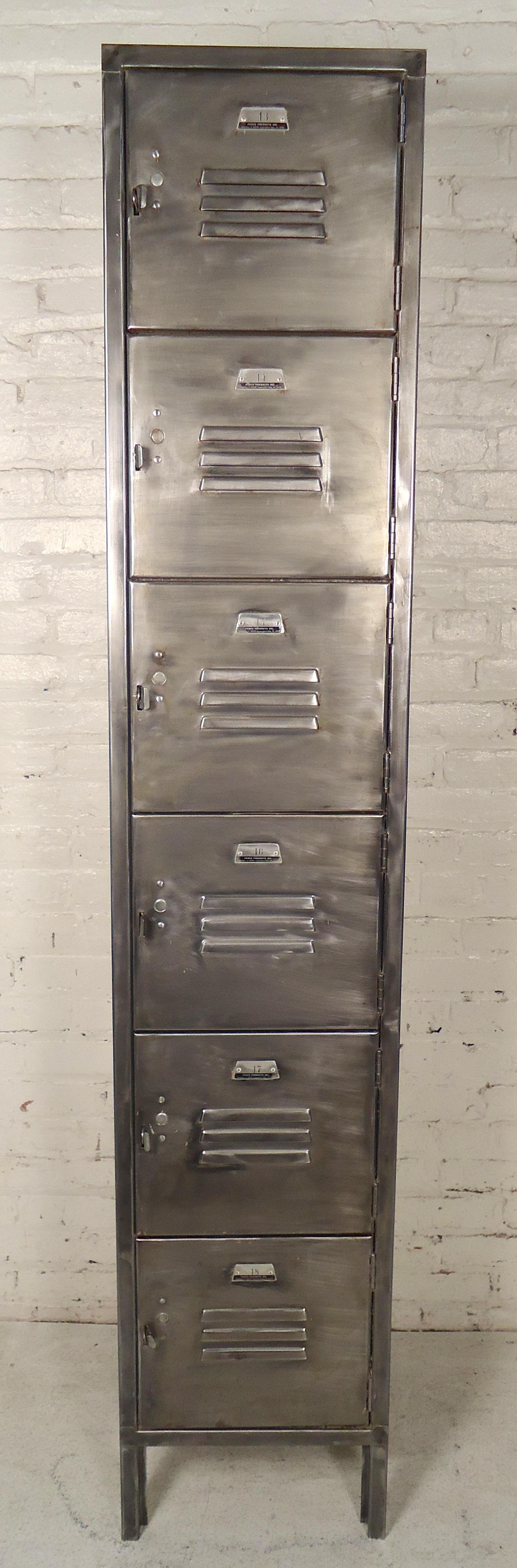 Vintage metal locker unit refinished in a bare metal style. Classic school house locker with six compartments. Great for home or office storage.

(Please confirm item location - NY or NJ - with dealer).
 