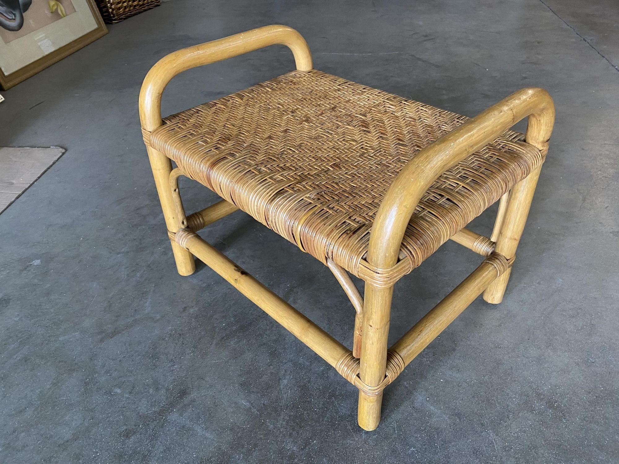 Restored 1950s rattan vanity stool with wicker seat featuring a 