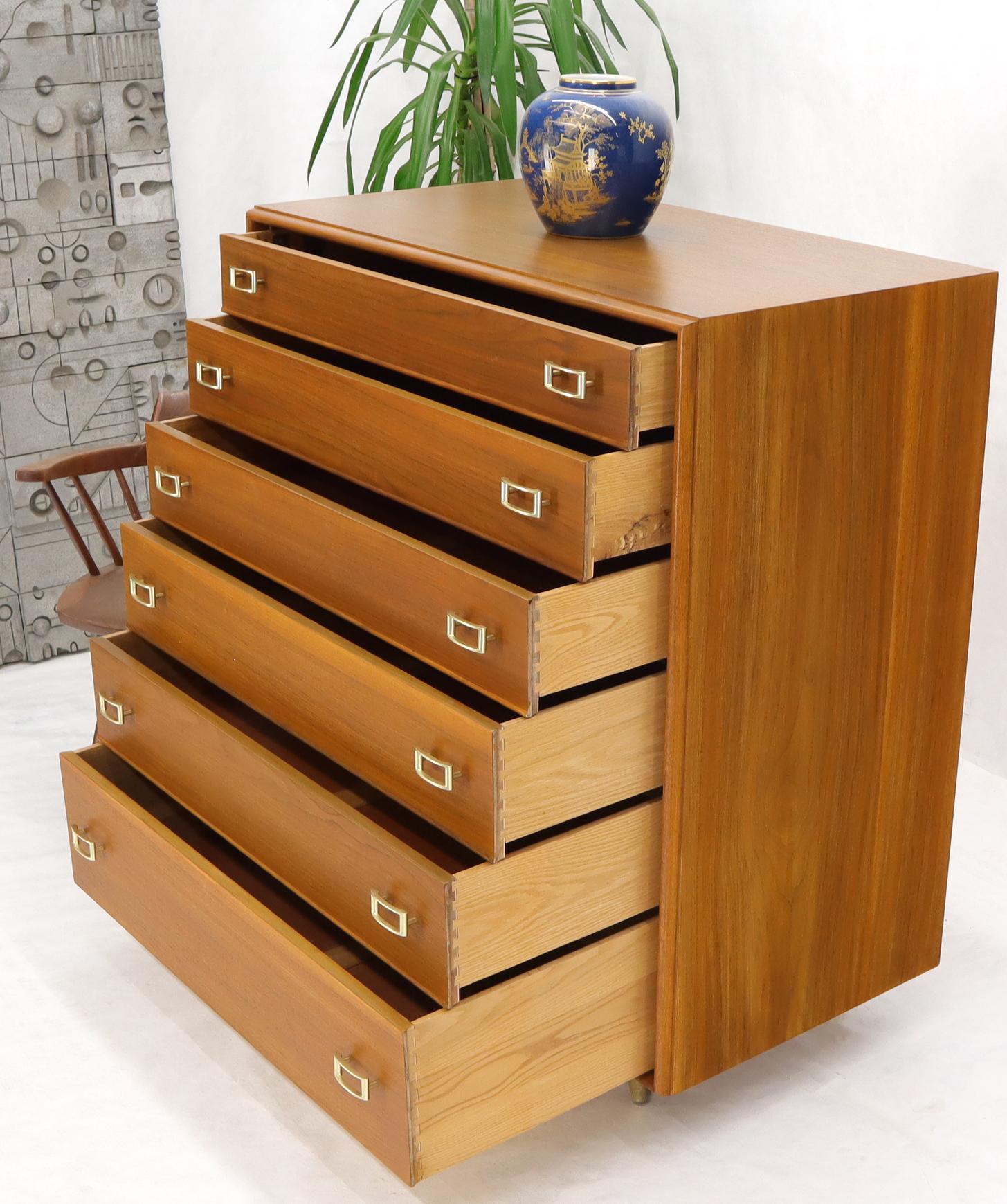 Century modern American walnut solid brass buckle shaped pulls hardware high chest dresser by Paul Frankl for Johnson Furniture Company.