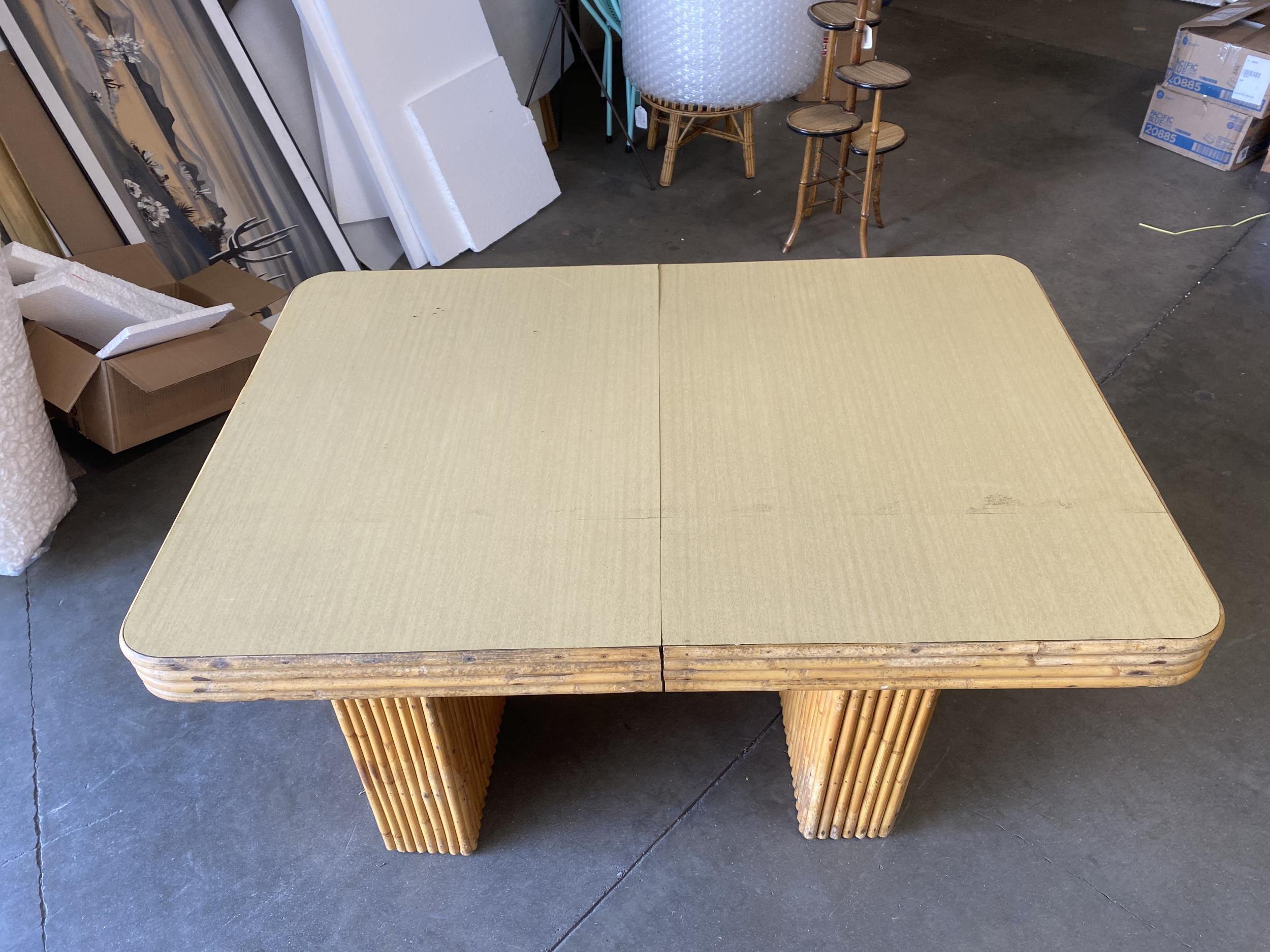 Mid-Century Modern Restored Six-Person Rattan and Formica Dining Table with Vertically Stacked Base For Sale