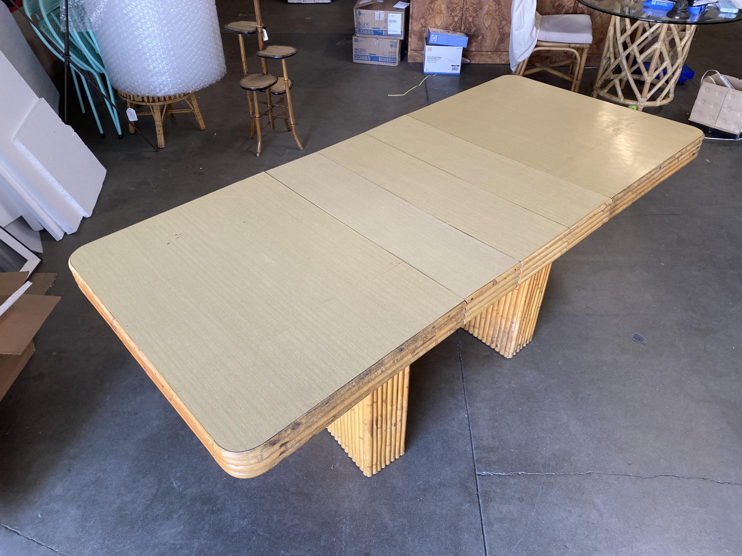 Restored Six-Person Rattan and Formica Dining Table with Vertically Stacked Base In Excellent Condition For Sale In Van Nuys, CA