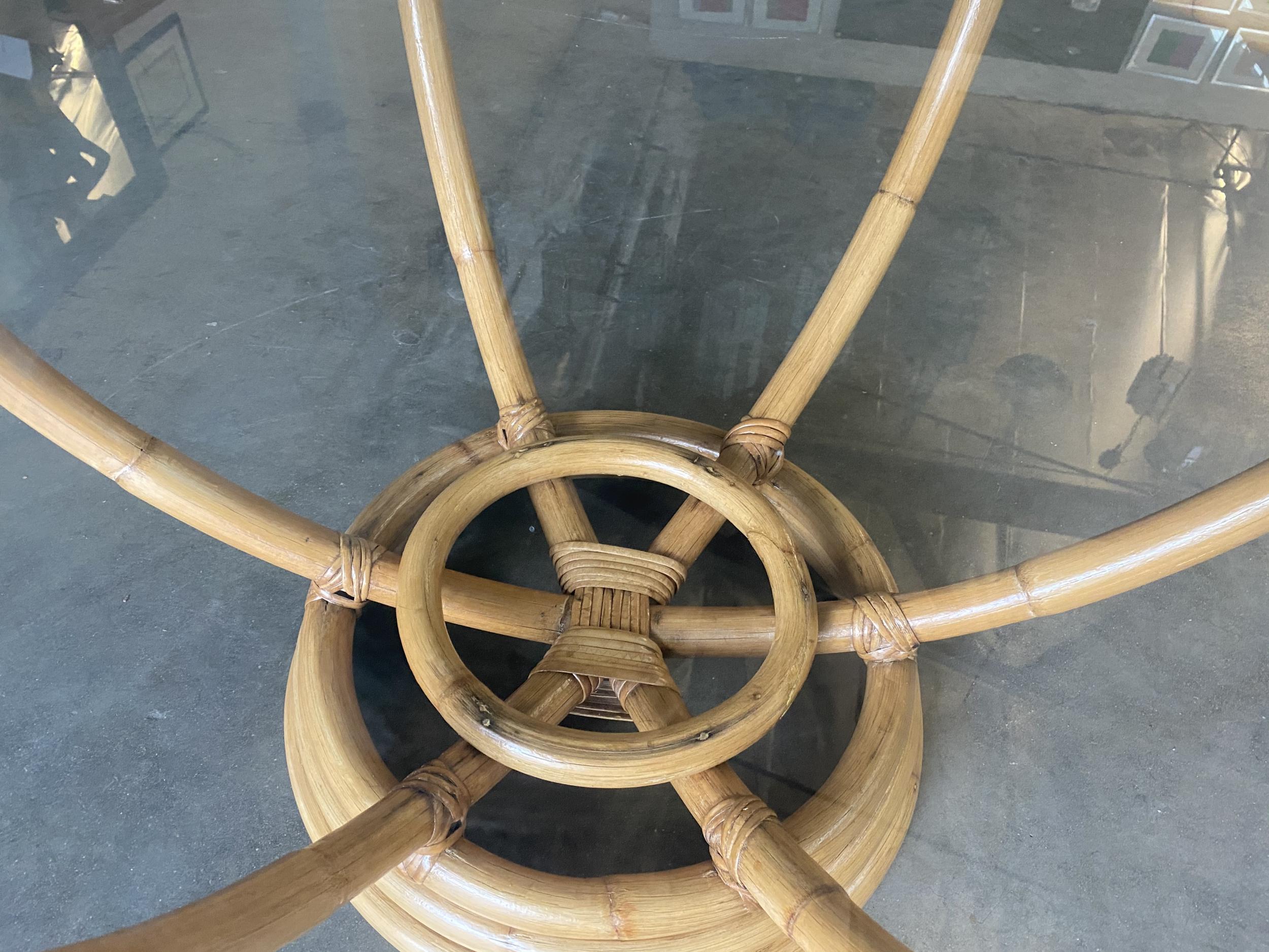 Restored Six-Pole Rattan Stacked Base Coffee Table with Floating Glass Top In Excellent Condition In Van Nuys, CA