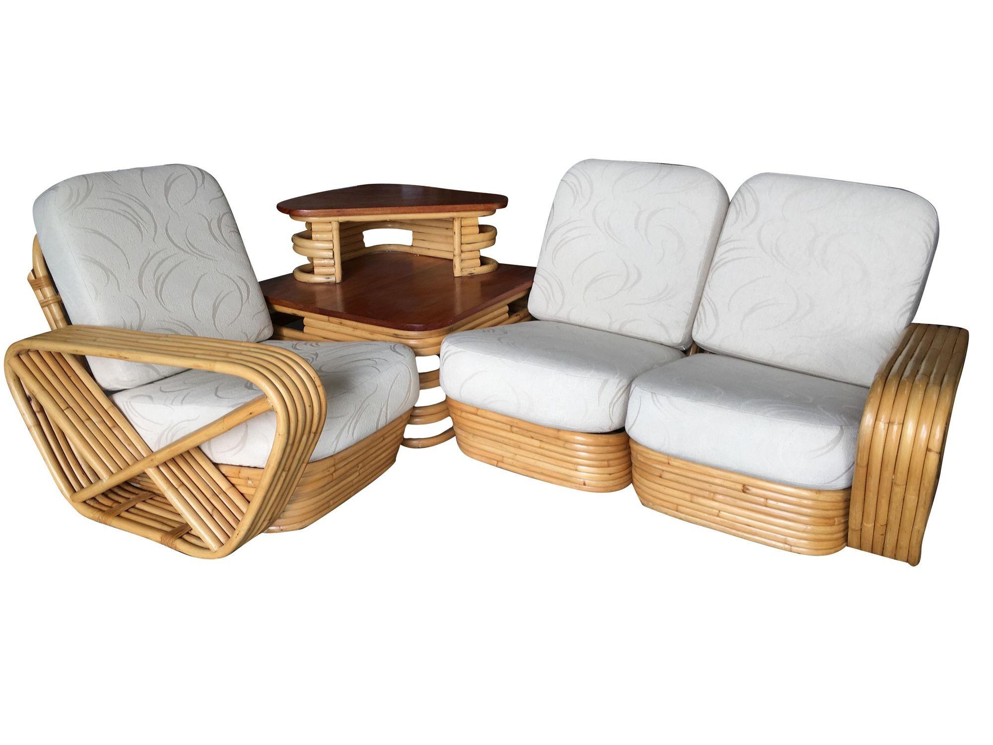 This beautifully restored Paul Frankl-inspired rattan blends vintage charm with modern comfort. Rare Square Pretzel rattan 3-seater sectional sofa with Paul Frankl-inspired design featuring 6 strand rattan arms and a Stacked pole base. Comes with a