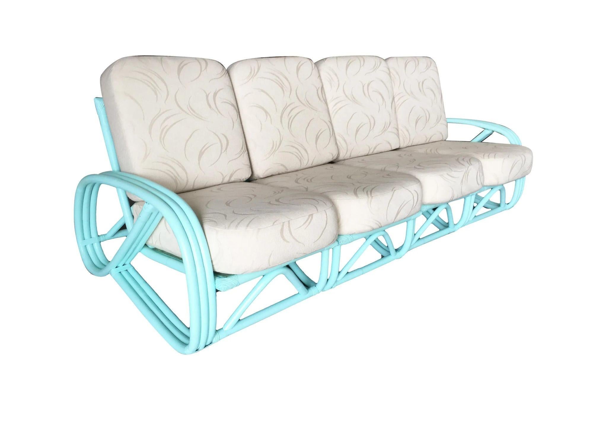 Rare teal Three-strand 3/4 reverse pretzel arm 4-seat rattan section sofa features a decorative arch along each base.
We only purchase and sell only the best and finest rattan furniture made by the best and most well-known American designers and