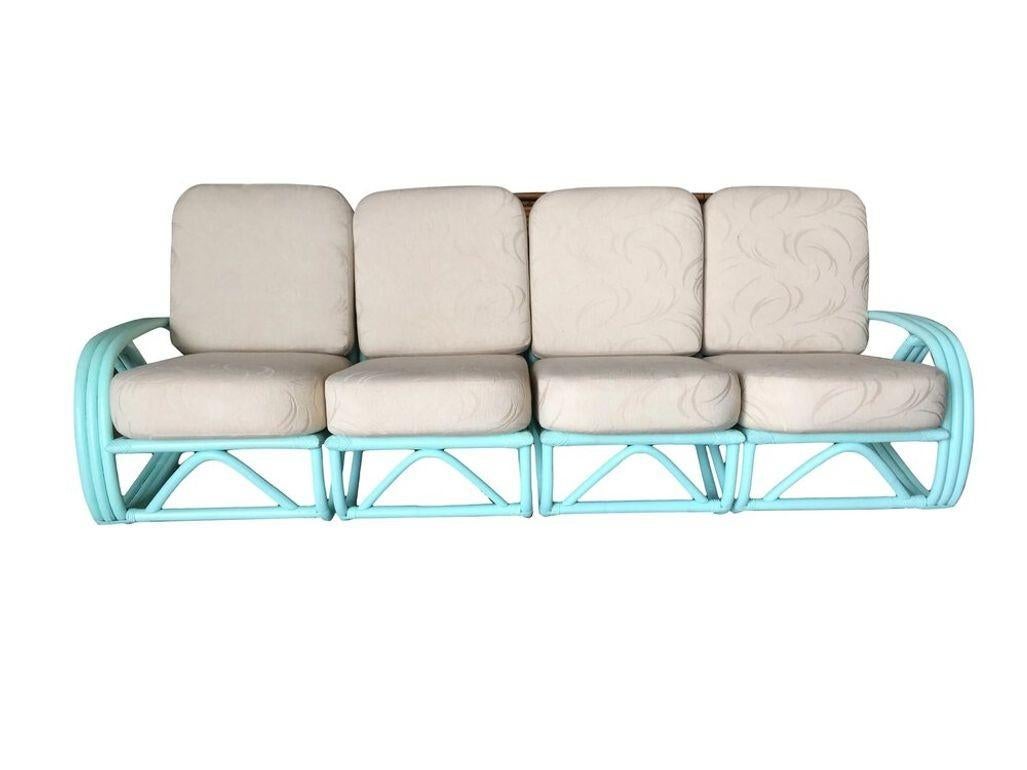 Rare teal Three-strand 3/4 pretzel arm 4-seat rattan section sofa features a decorative arch along each base.
We only purchase and sell only the best and finest rattan furniture made by the best and most well-known American designers and