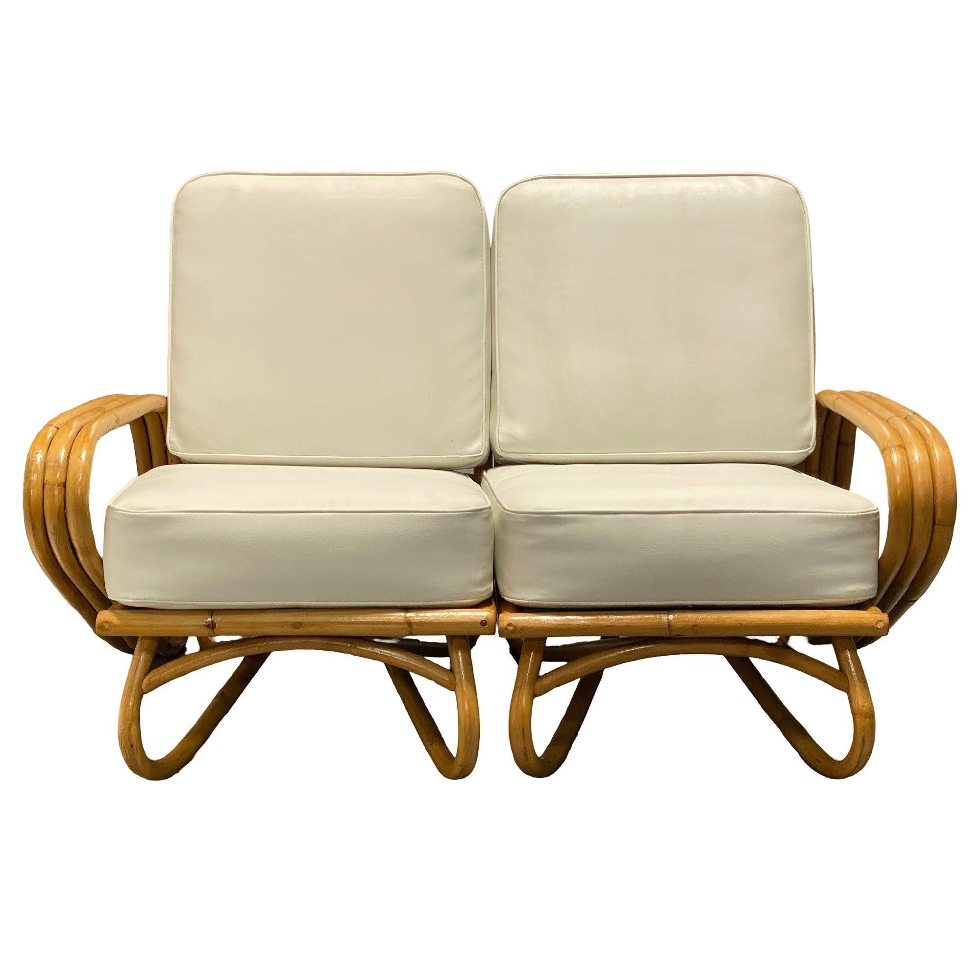 This beautifully restored Paul Frankl-inspired 3-strand Rattan 