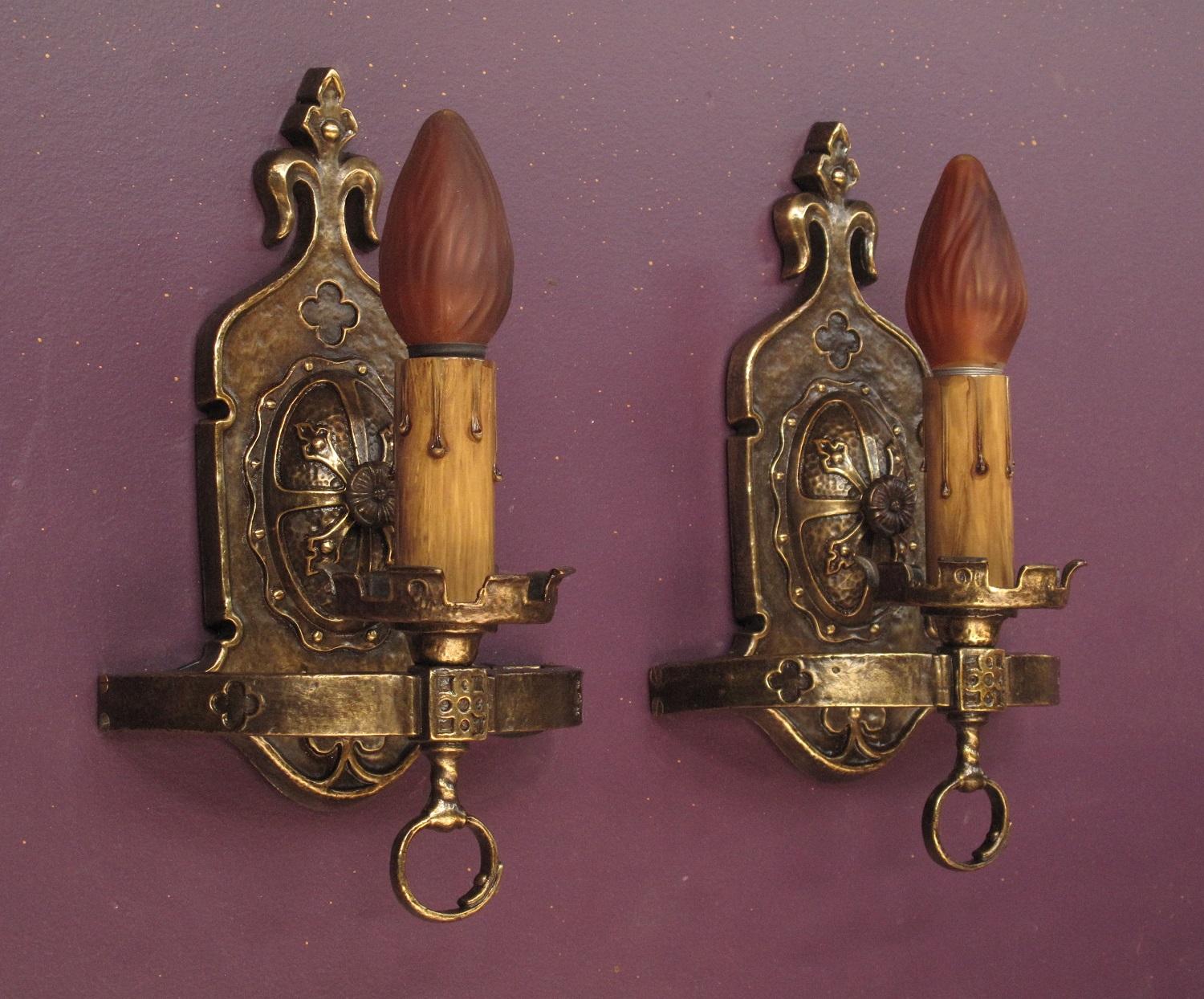Priced per pair with two pair available.
Manufacture by Lion, these are hefty in both weight and design. Restored to bring out the solid cast brass construction as well as all the elements incorporated into the design. With no paint used in their