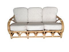 Restored Two-Strand "Circles and Speed" Three Seat Rattan Sofa