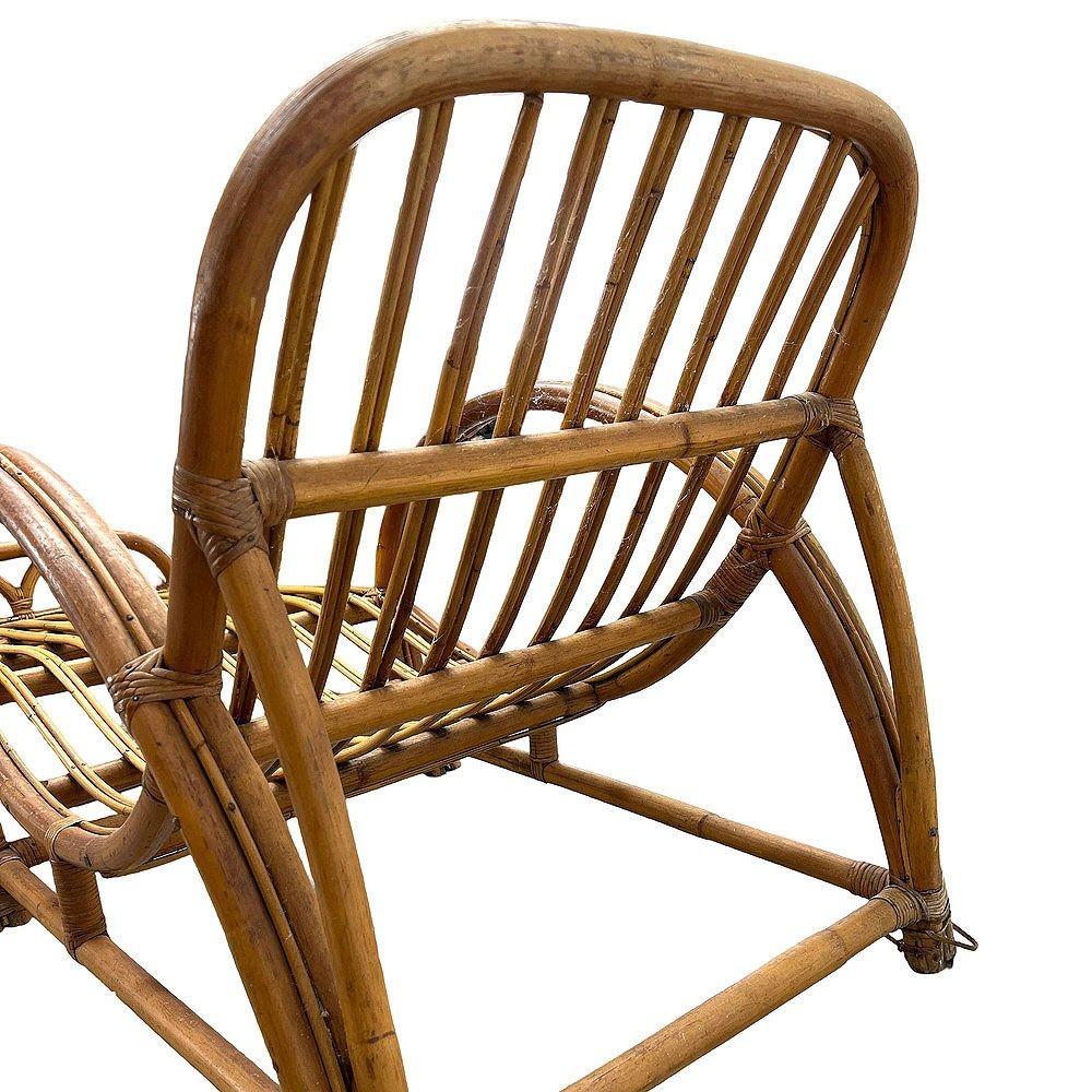 Chaise longue restaurada de ratán con asiento de copa 
