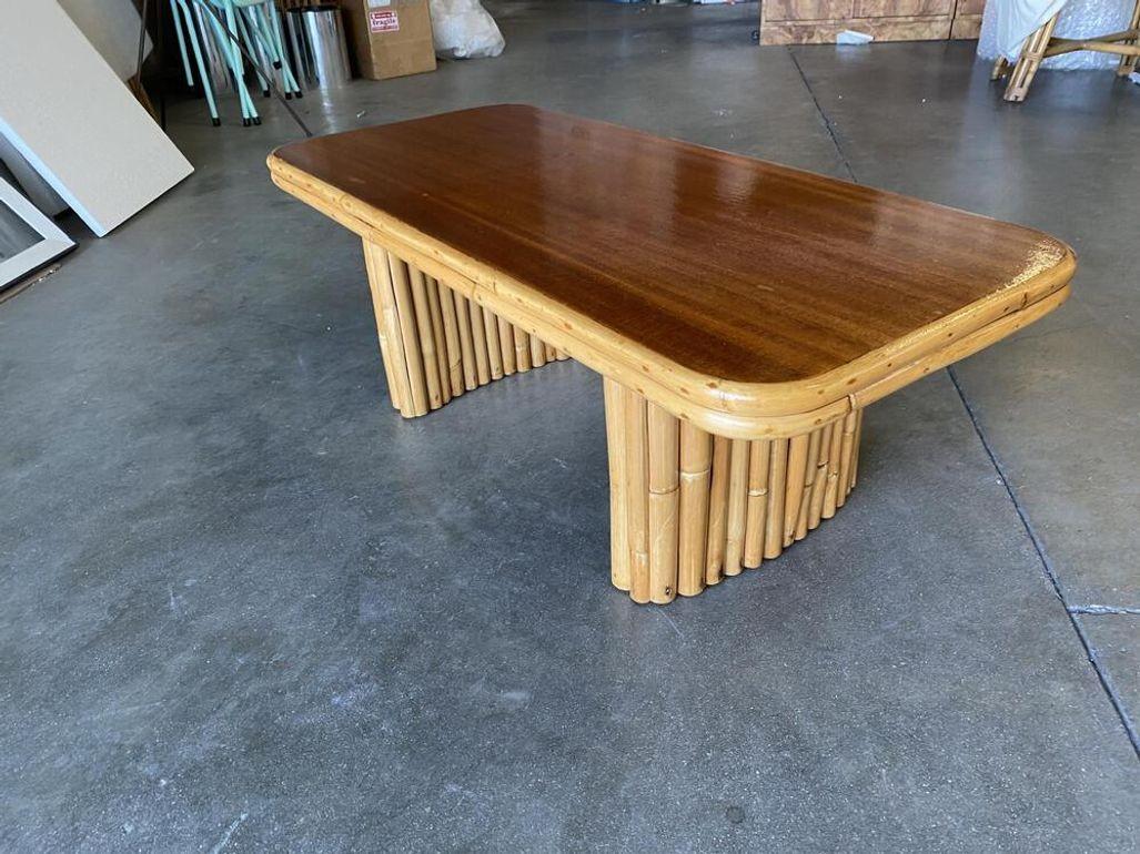Restored Vertically Stacked Rattan Pedestal Coffee Table W/ Mahogany Top In Excellent Condition For Sale In Van Nuys, CA