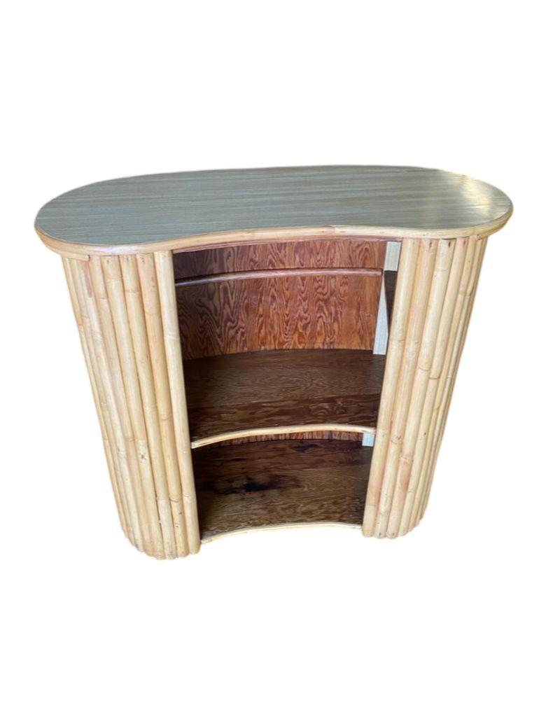 Restored Vertically Stacked Curved Stacked Dry Rattan Bar For Sale 1