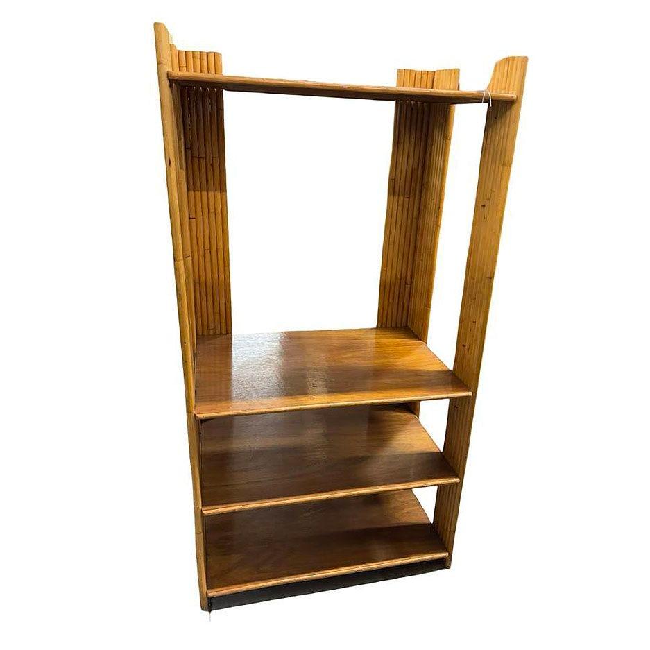 This beautifully restored Paul Frankl-inspired Mid-century vertically stacked rattan 4-tiered shelf with Mahogany Shelving is a fusion of natural tropical textures and mid-20th century modern design. This elegant piece features four stacked rattan