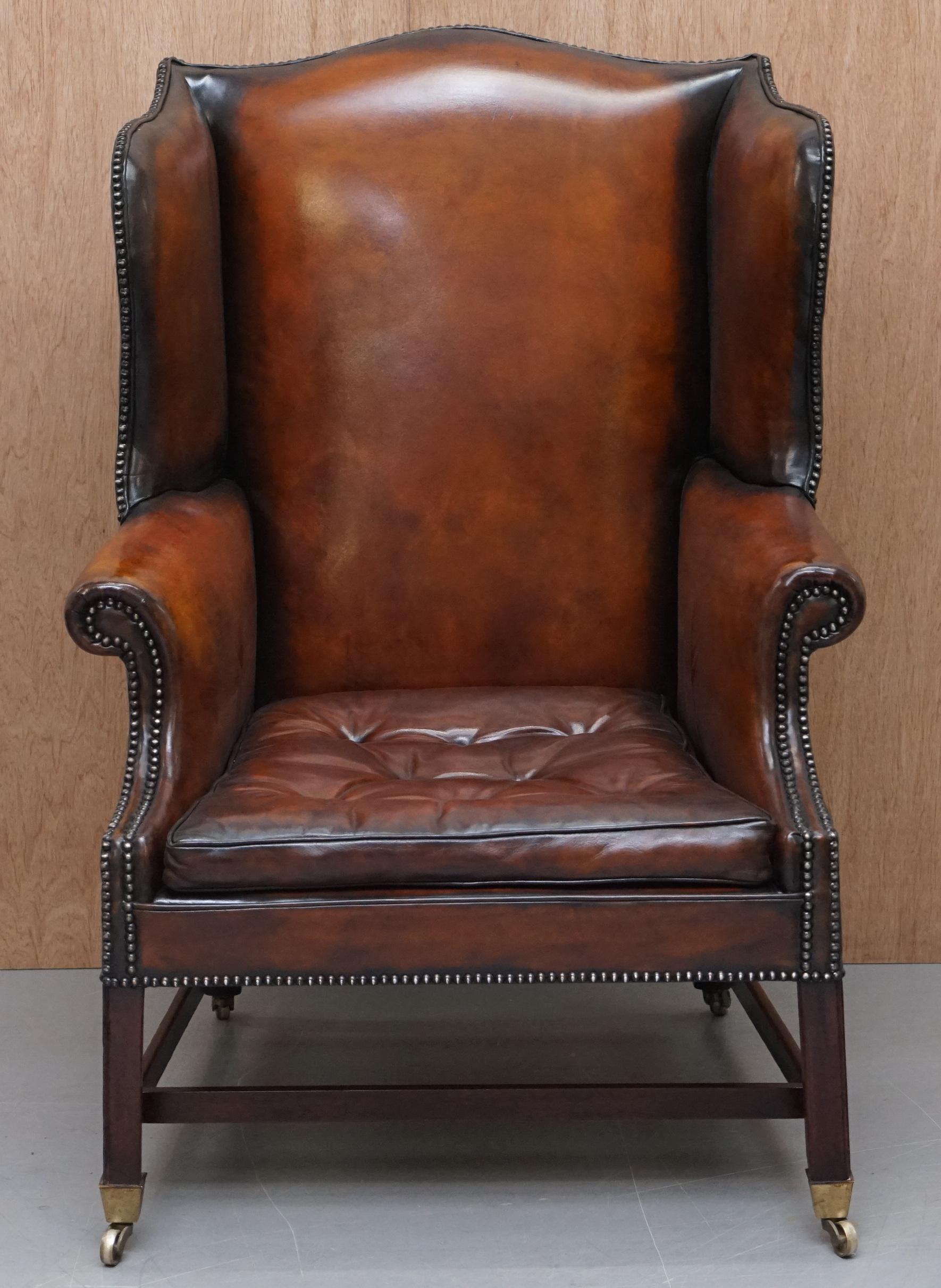 We are is delighted to offer for sale this stunning fully restored cigar brown hand dyed leather Victorian wingback armchair with Thomas Chippendale floating button cushion 

A very good looking and nicely refurbished piece. This is an original