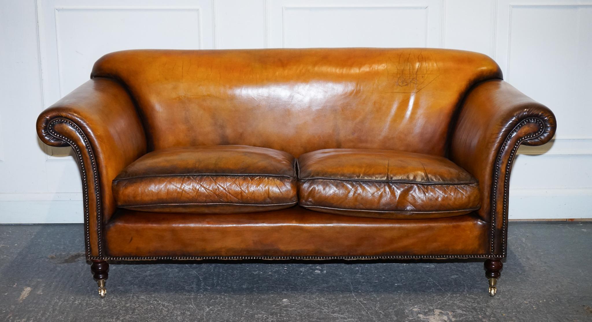
Antiques of London



A superb Victorian two-seat sofa, beautifully restored and hand-dyed to a rich tan brown finish. This piece showcases all the hallmarks of 19th-century craftsmanship with the added benefit of a full professional restoration,