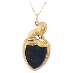 Pendentif victorien restauré gravé à la main en pierre de sang de lion 9 et 15 carats