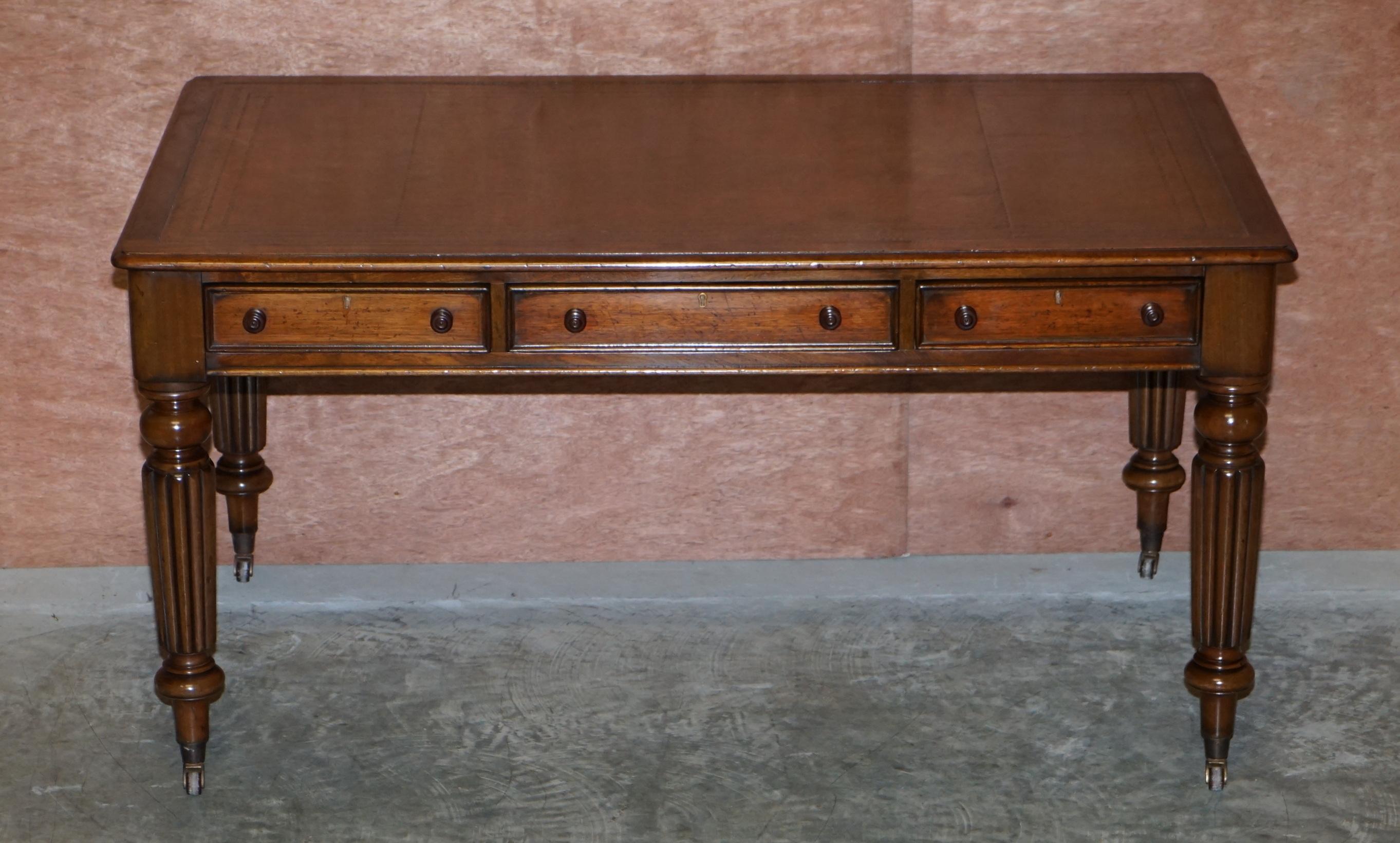 We are delighted to offer for sale this stunning, fully restored Victorian library table writing desk with brown leather gold leaf tooled writing surface and Gillows style reeded legs 

A very fine piece of Victorian Library furniture. Its a large