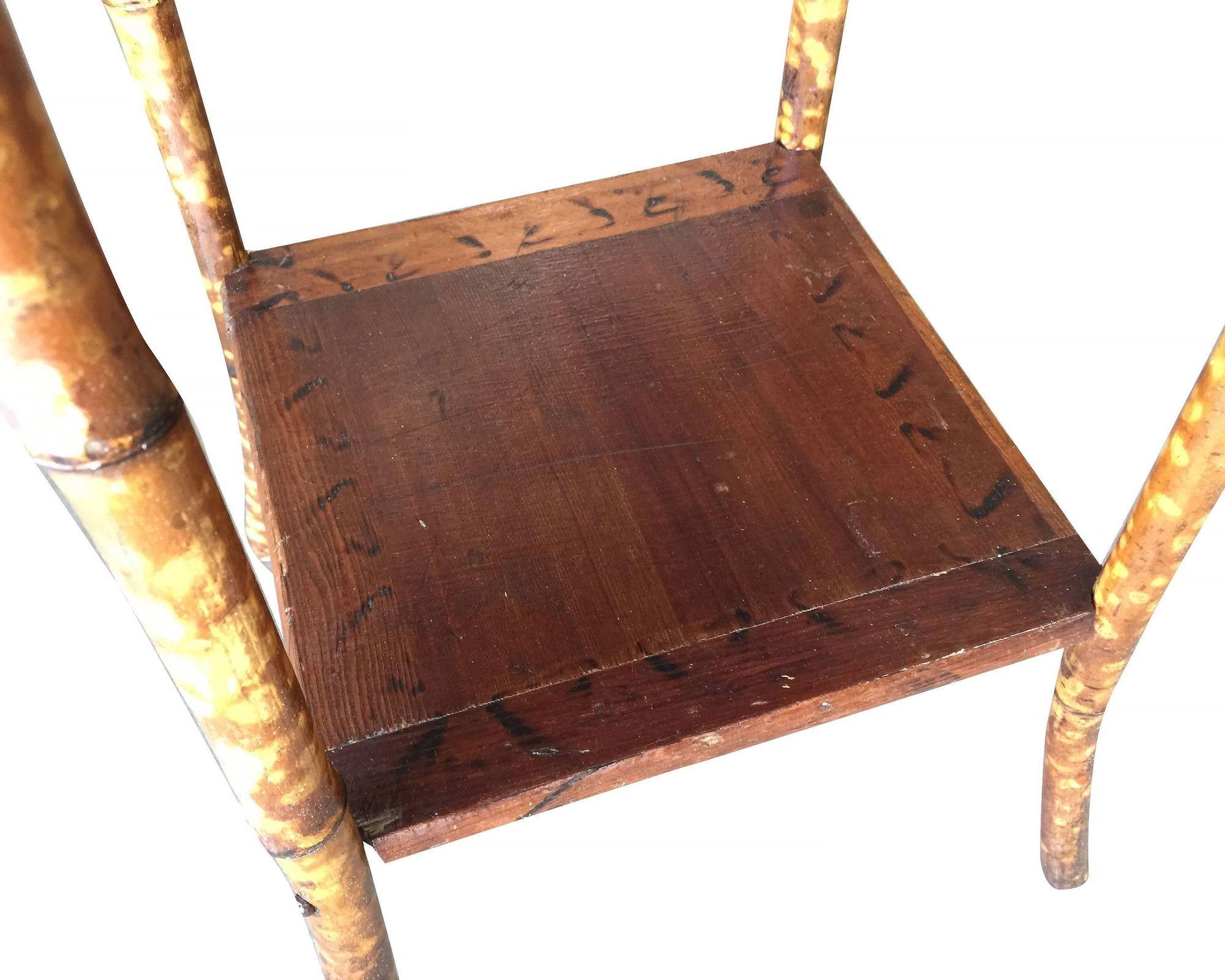 Antique tiger bamboo pedestal side table with rice mat top with flip open lid storage and a secondary bottom shelf.


Restored to new for you.

All rattan, bamboo and wicker furniture has been painstakingly refurbished to the highest standards