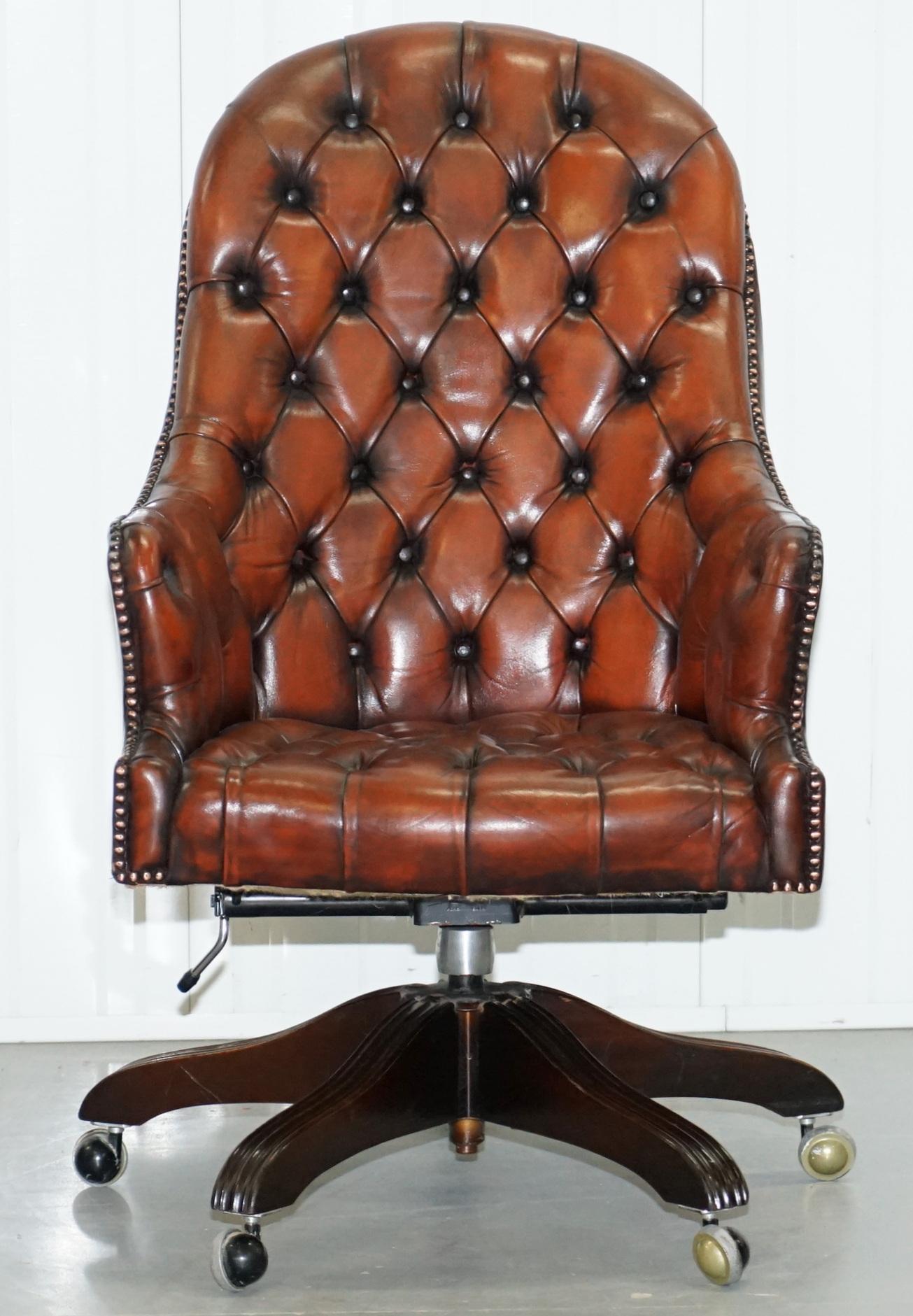 We are delighted to offer for sale this lovely fully restored vintage Chesterfield fully buttoned hand dyed mahogany brown leather captains chair.

This piece has been fully restored to include having the leather stripped back then hand dyed this