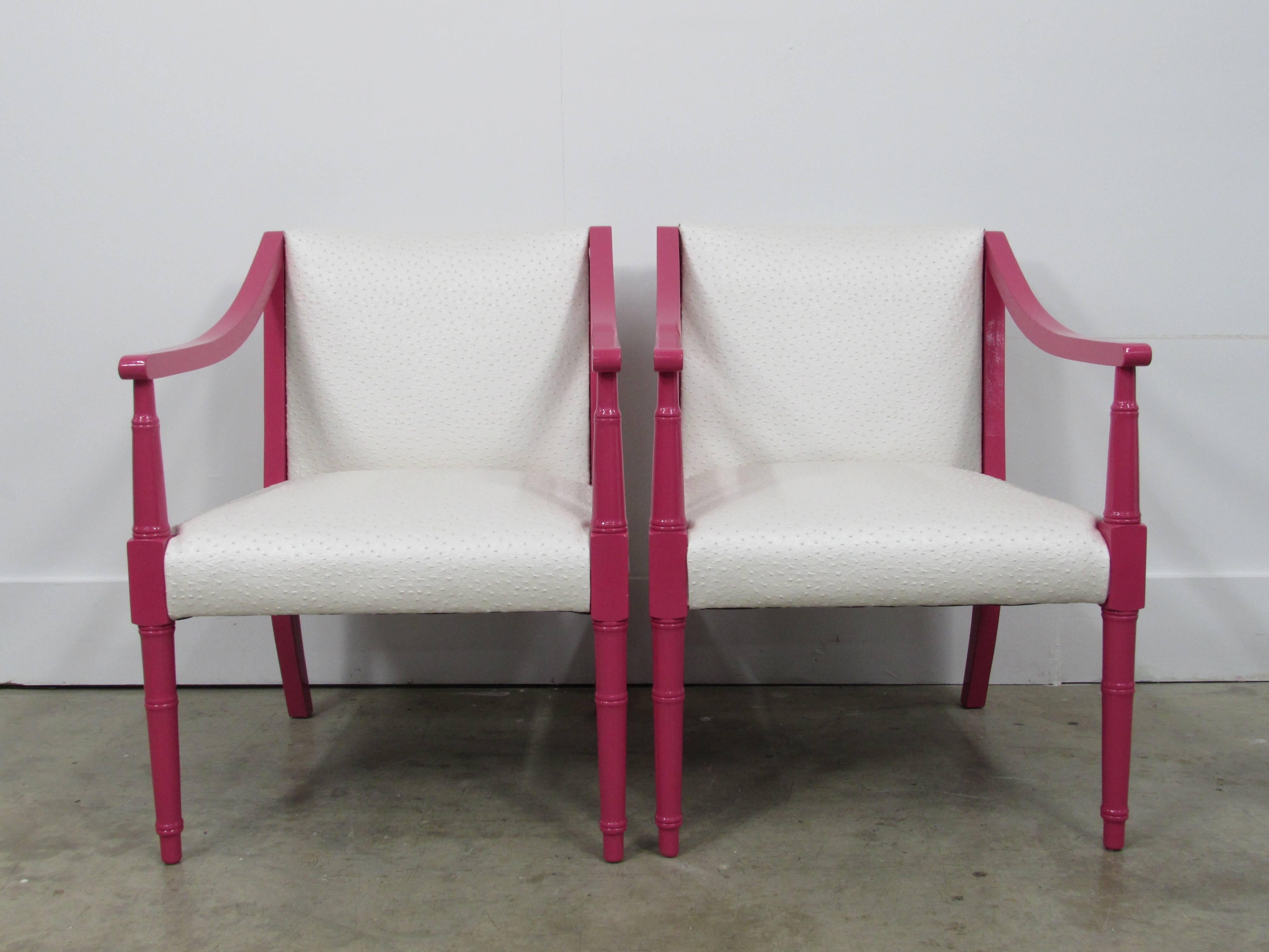 Pair of vintage walnut Club chairs with faux bamboo leg accents and professionally lacquered In-house in Benjamin Moore peony pink and newly upholstered in an ostrich embossed vinyl fabric. Measure: Seat height 16.5