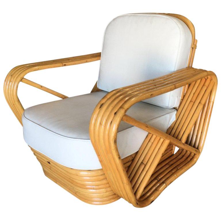 La chaise longue en rotin à cinq brins inspirée par Paul AT&T est dotée d'accoudoirs carrés en forme de bretzel et d'une base empilée classique. 

Restauré à neuf pour vous.

Nous n'achetons et ne vendons que les meilleurs meubles en rotin fabriqués