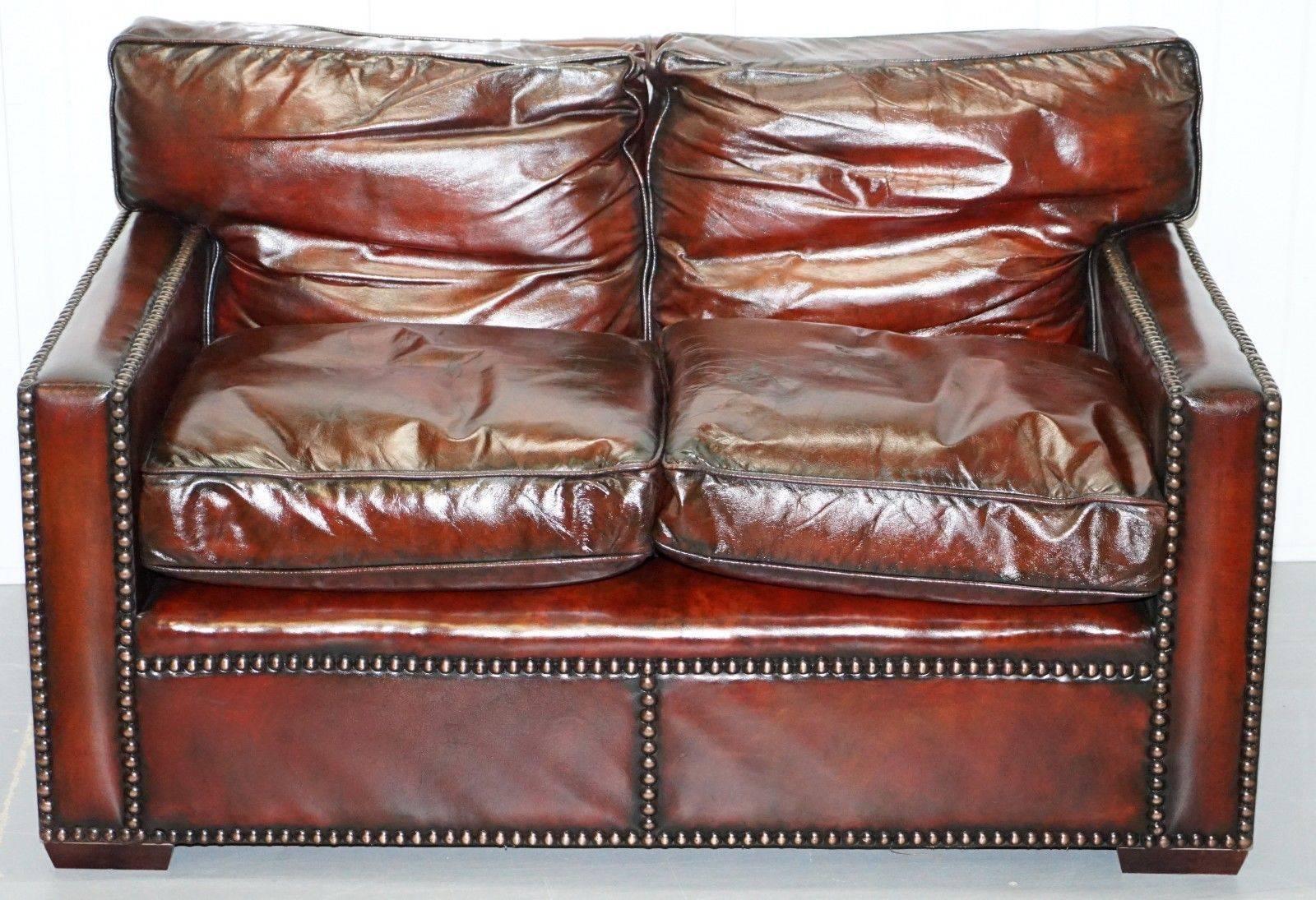 We are delighted to offer for sale this stunning fully restored Bordeaux leather Gentleman’s club sofa part of a large suite with a great history

This piece is part of a suite, all restored to the same finish and standard, I have two two-seat