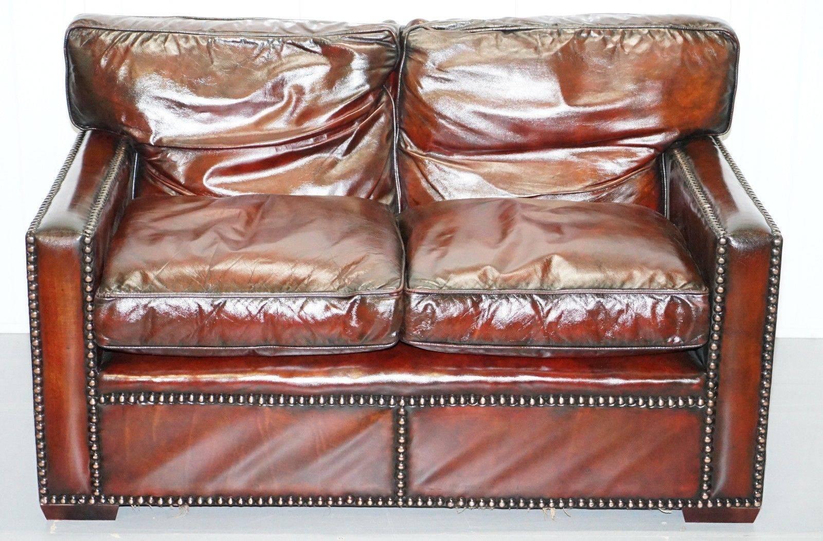 We are delighted to offer for sale this stunning fully restored Bordeaux leather Gentleman’s club sofa part of a large suite with a great history

This piece is part of a suite, all restored to the same finish and standard, I have two two-seater