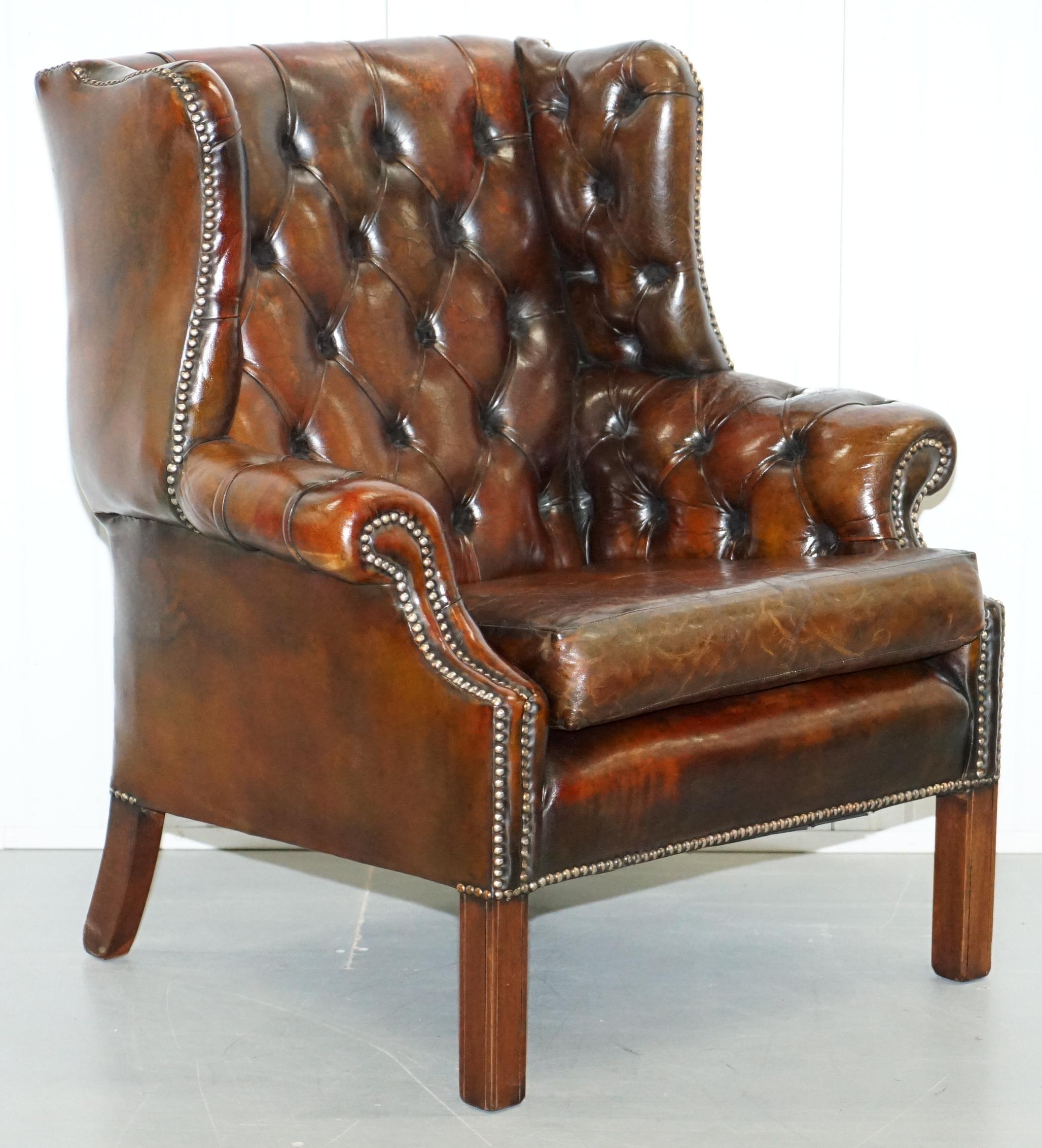 We are delighted to offer for sale this lovely midcentury restored Chesterfield wingback armchair and footstool in brown leather upholstery

A lovely pair, full of vintage charm and character, we have restored them to include having the old colour